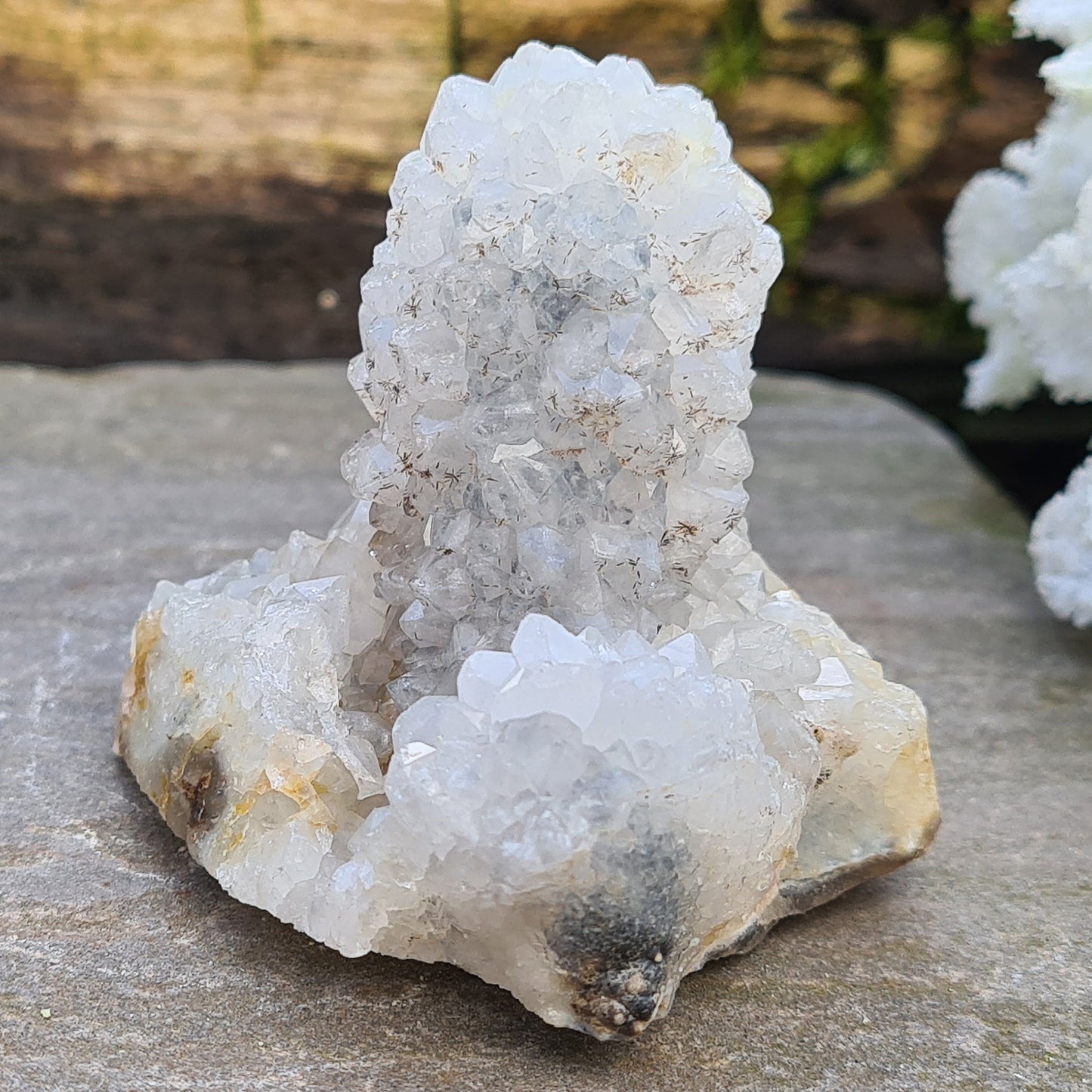 This unique Stalactite Quartz formation grows from mineral-rich water dripping from cave ceilings, creating layered elongated crystals. This piece also resembles Spirit Quartz, offering a rare and beautiful addition to your collection.