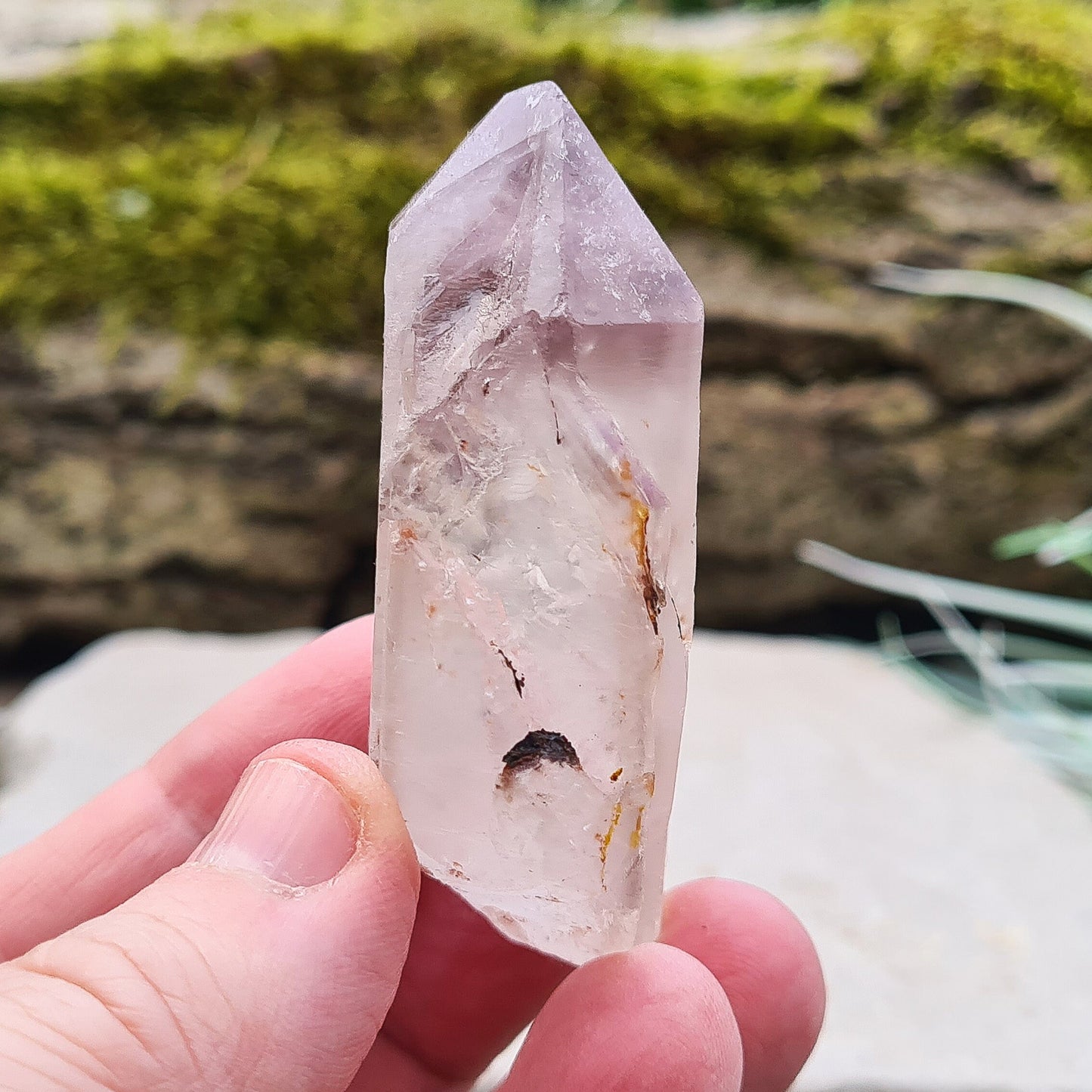 This natural Quartz and Amethyst crystal point from Madagascar features a clear Quartz base with a rich Amethyst tip. Known for its unique energy, this piece is both visually appealing and energetically powerful.