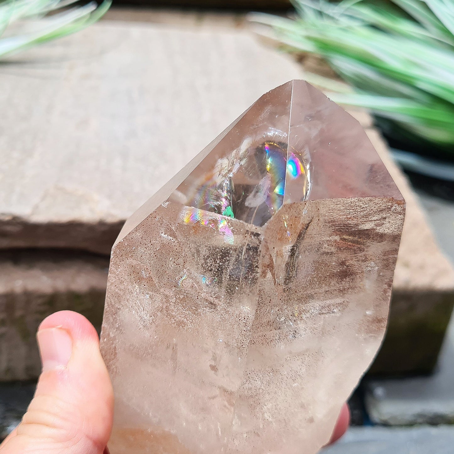 Natural Smoky Quartz Crystal Point From Brazil. This is a fabulous lighter coloured smoky quartz point, and I can see a couple of rainbows within it