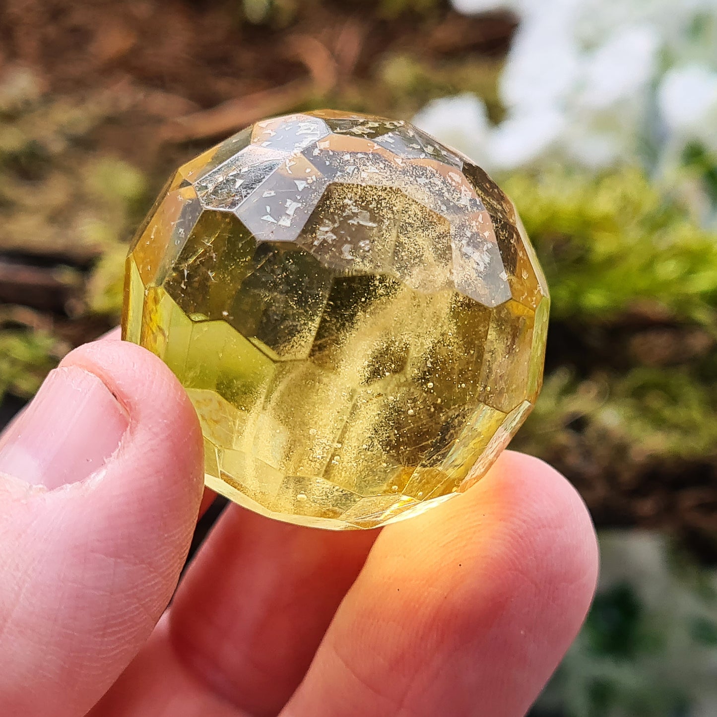 Colombian Copal Amber Faceted Sphere. This has been beautifully crafted.