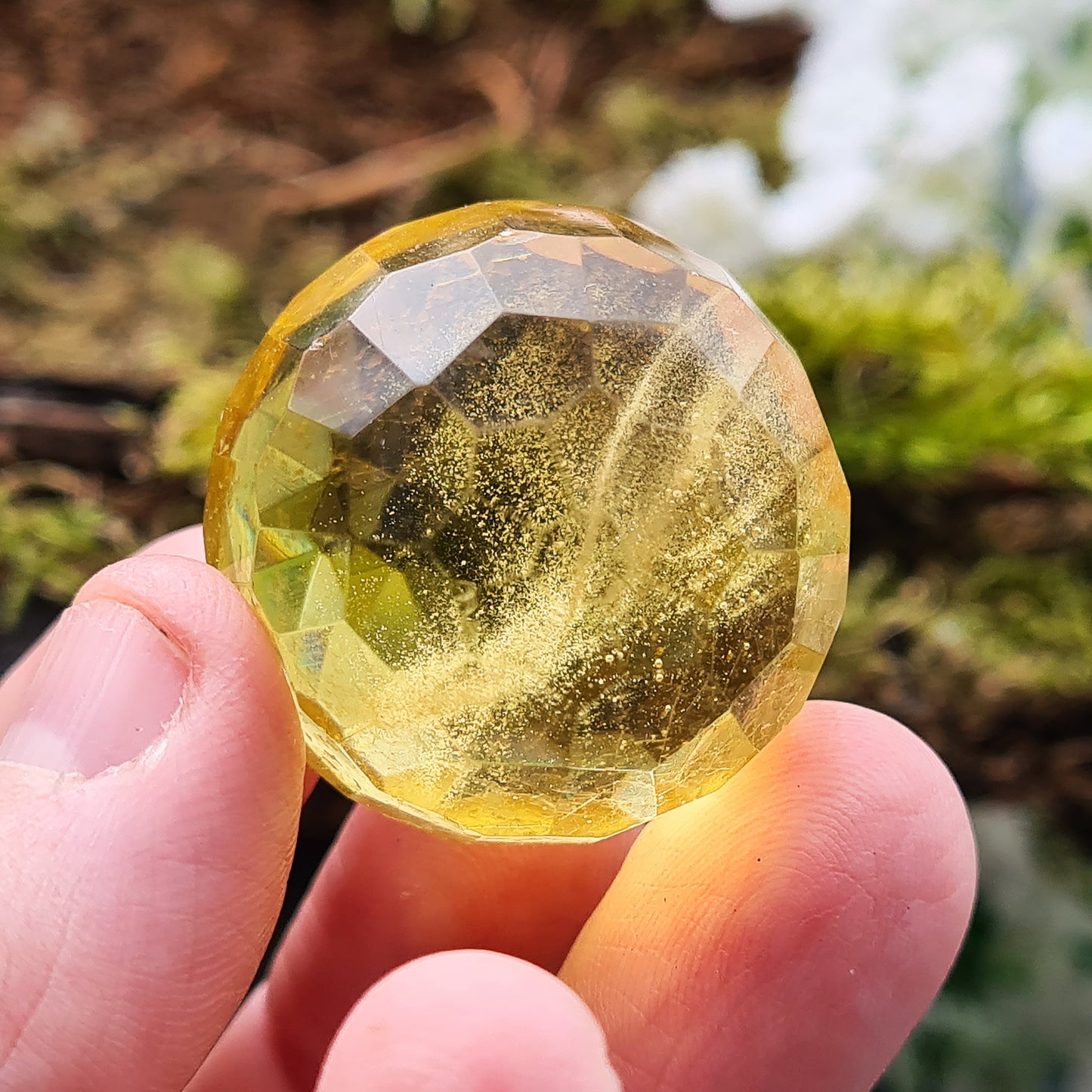 Colombian Copal Amber Faceted Sphere. This has been beautifully crafted.