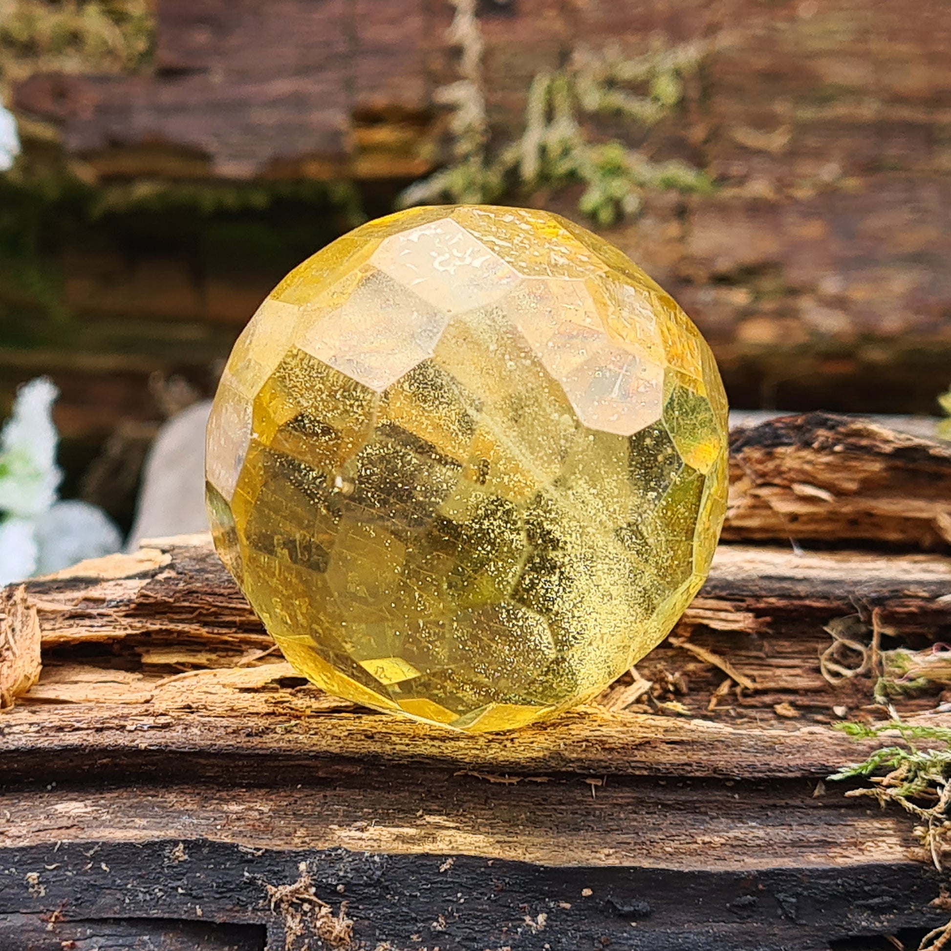 Warm, golden amber sphere with faceted round shape, ideal for calming energy, protection, and balancing emotions. Perfect for collectors, healers and you.