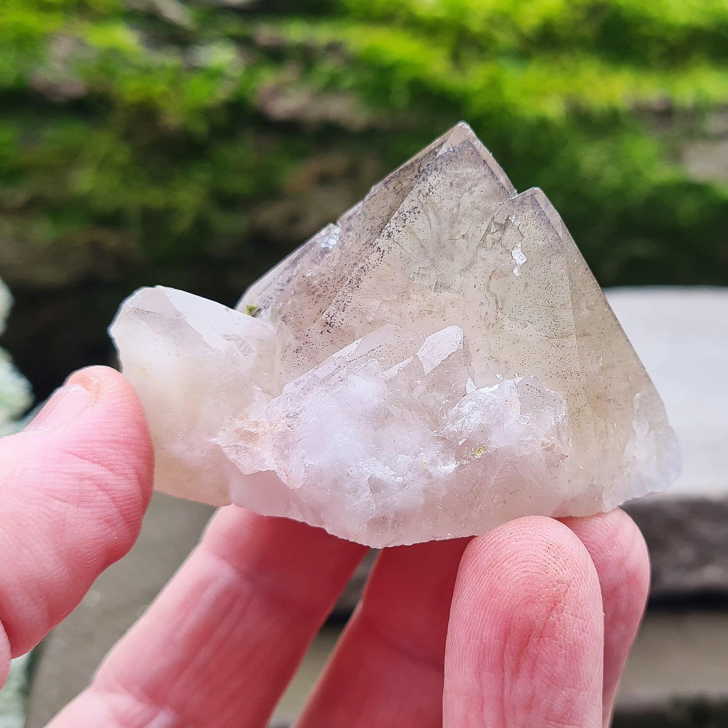 This beautiful Ametrine with Hematite Crystal Standing Point comes from China. A colour shines through in natural light, with a double polished tip, natural body, and a cut base. The addition of Hematite grounds Ametrine’s mental clarity and spiritual uplift, creating a deeply balancing and energising piece.