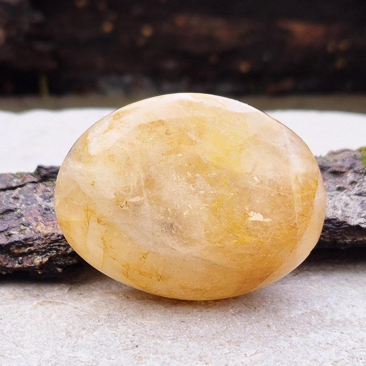 This beautiful Golden Healer Quartz palm stone features natural golden tones created by iron oxide inclusions within the quartz. Polished and sized to fit comfortably in your hand.