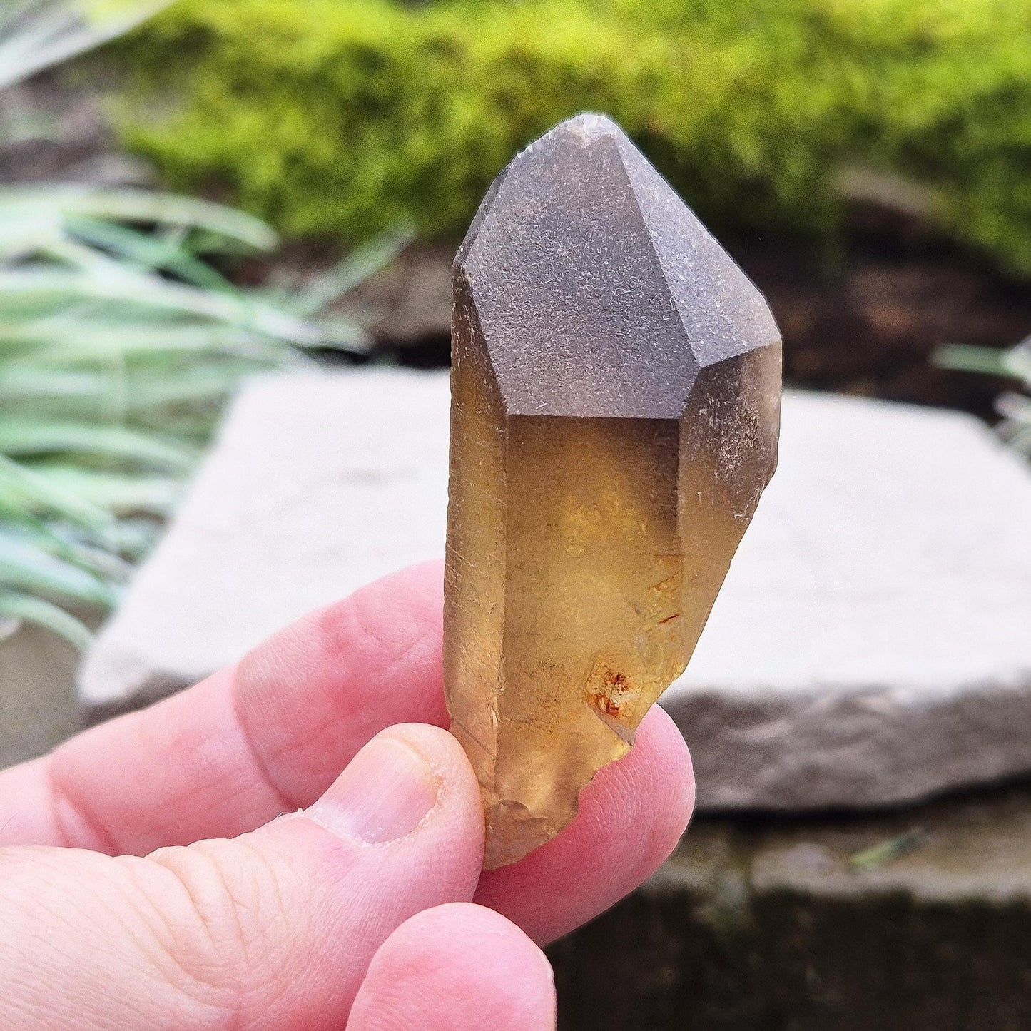 Natural Untreated Citrine Crystal Point from Northern Zambia, has a nice dark honey colour. Raw and unpolished, this crystal point offers an authentic, natural touch to any collection. Great for personal use in meditation or energy work.