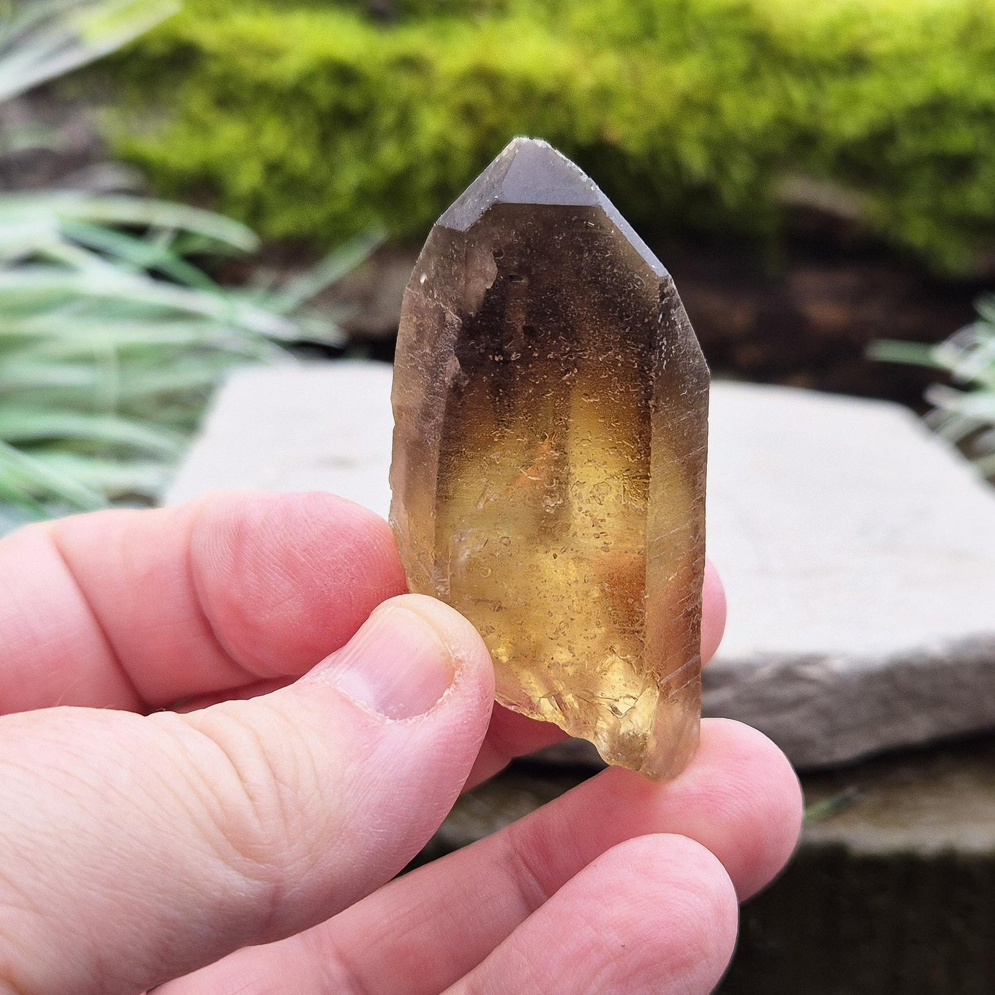 Natural Untreated Citrine Crystal Point from Northern Zambia, has a nice dark honey colour. Raw and unpolished, this crystal point offers an authentic, natural touch to any collection. Great for personal use in meditation or energy work.