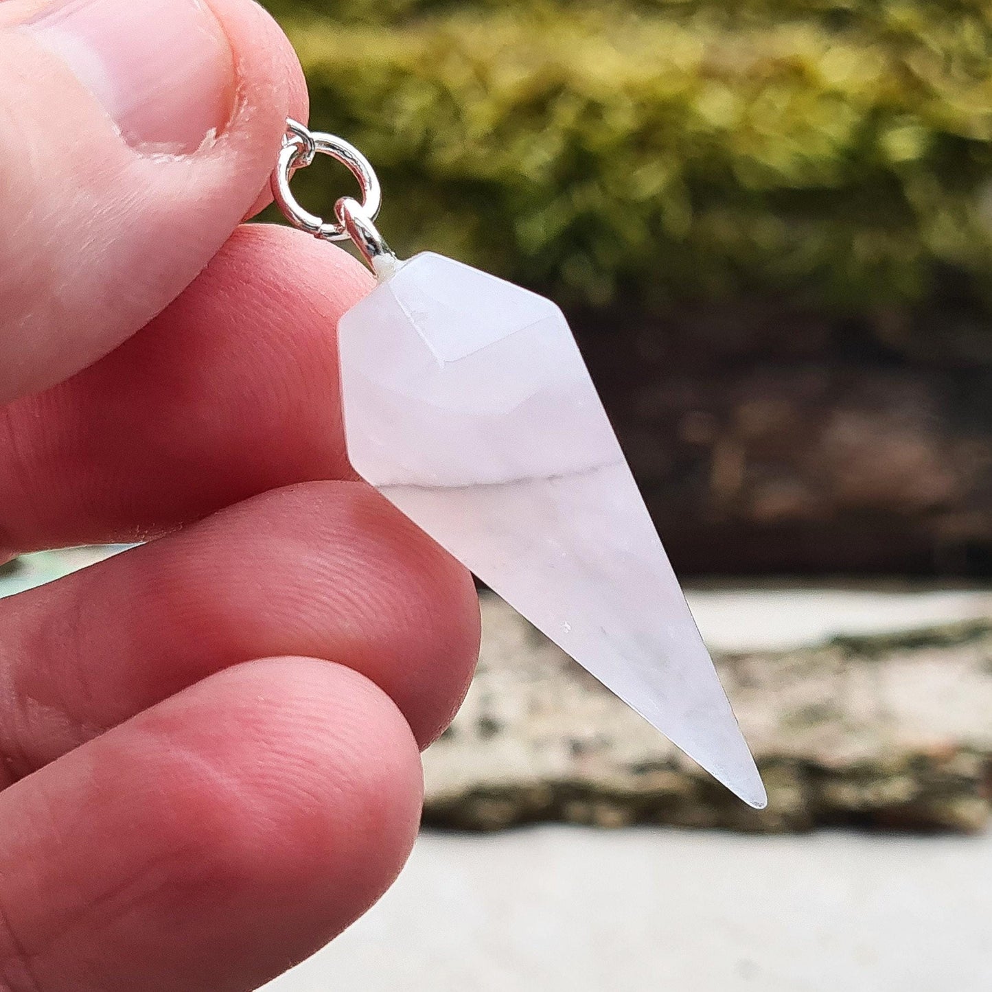 Lunar Rose Quartz Crystal Pendulum or Lunar Quartz Crystal. Is from one source in Namibia. It will come in a box or an organza pouch to keep it in.