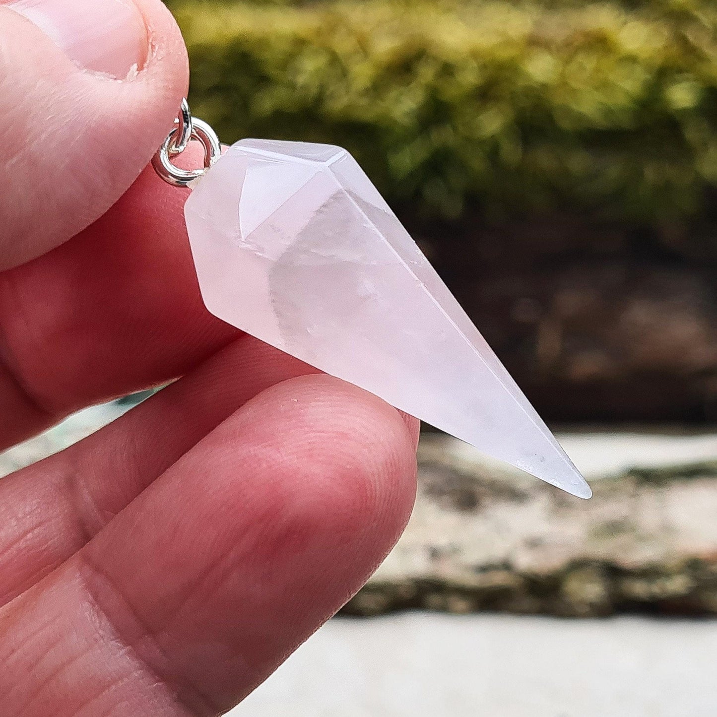 Lunar Rose Quartz Crystal Pendulum or Lunar Quartz Crystal. Is from one source in Namibia. It will come in a box or an organza pouch to keep it in.