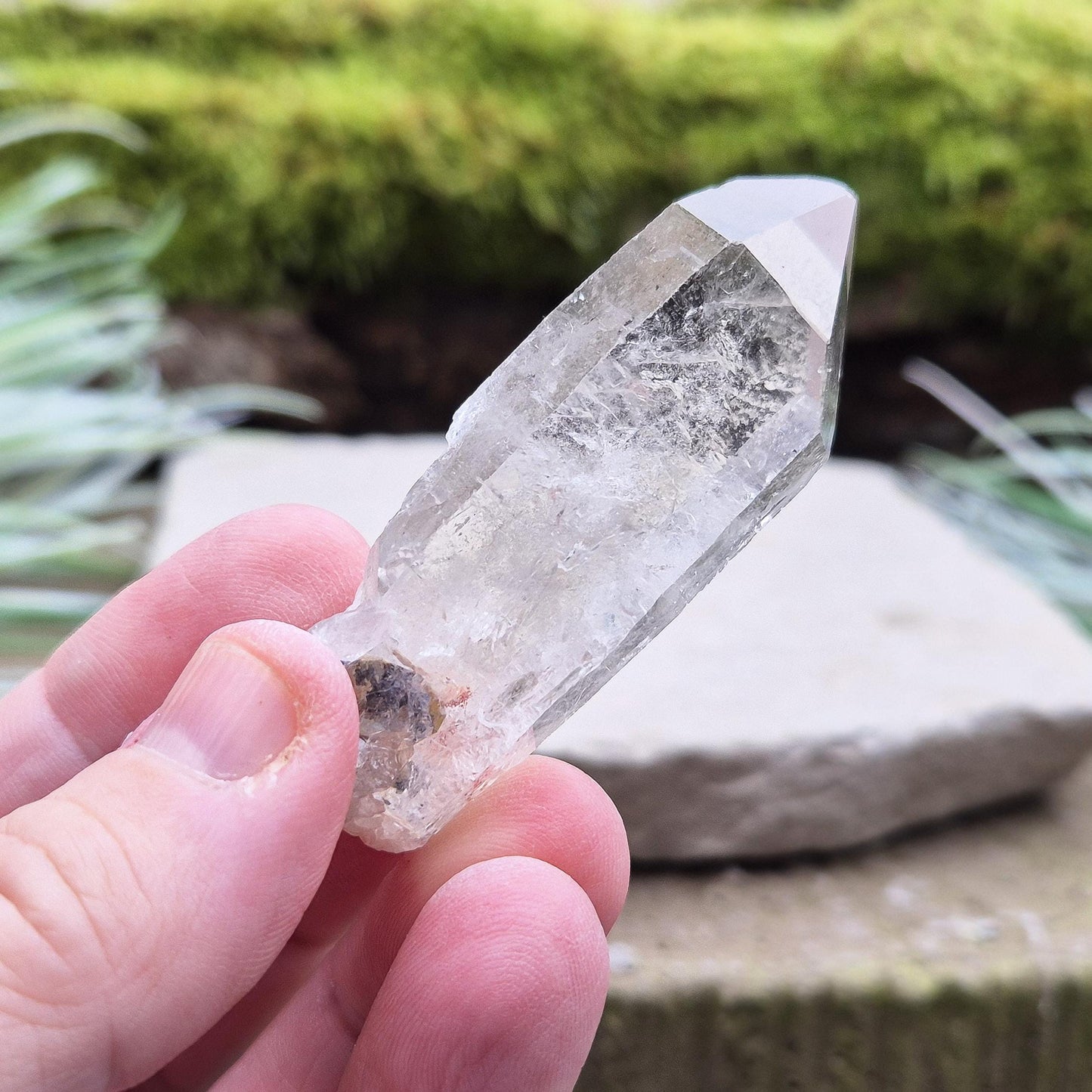 Starbrary Quartz Crystal Point From Brazil. This crystal is a point has nice clarity and lovely Starbrary markings on at least 2 sides.
Starbrary Quartz is known for its clear surfaces etched with geometric shapes like triangles, lines, and symbols.