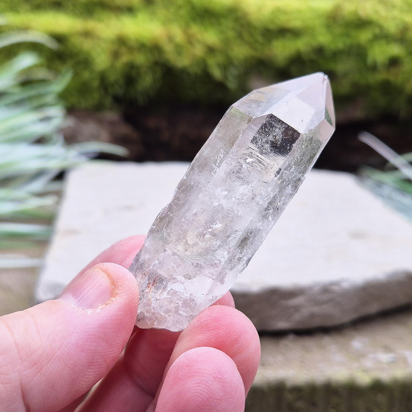 Starbrary Quartz Crystal Point From Brazil. This crystal is a point has nice clarity and lovely Starbrary markings on at least 2 sides.
Starbrary Quartz is known for its clear surfaces etched with geometric shapes like triangles, lines, and symbols.