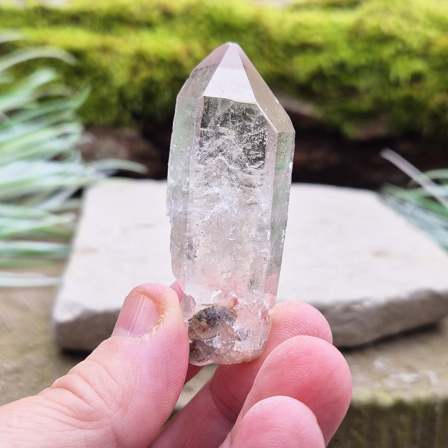 Starbrary Quartz Crystal Point From Brazil. This crystal is a point has nice clarity and lovely Starbrary markings on at least 2 sides.
Starbrary Quartz is known for its clear surfaces etched with geometric shapes like triangles, lines, and symbols.