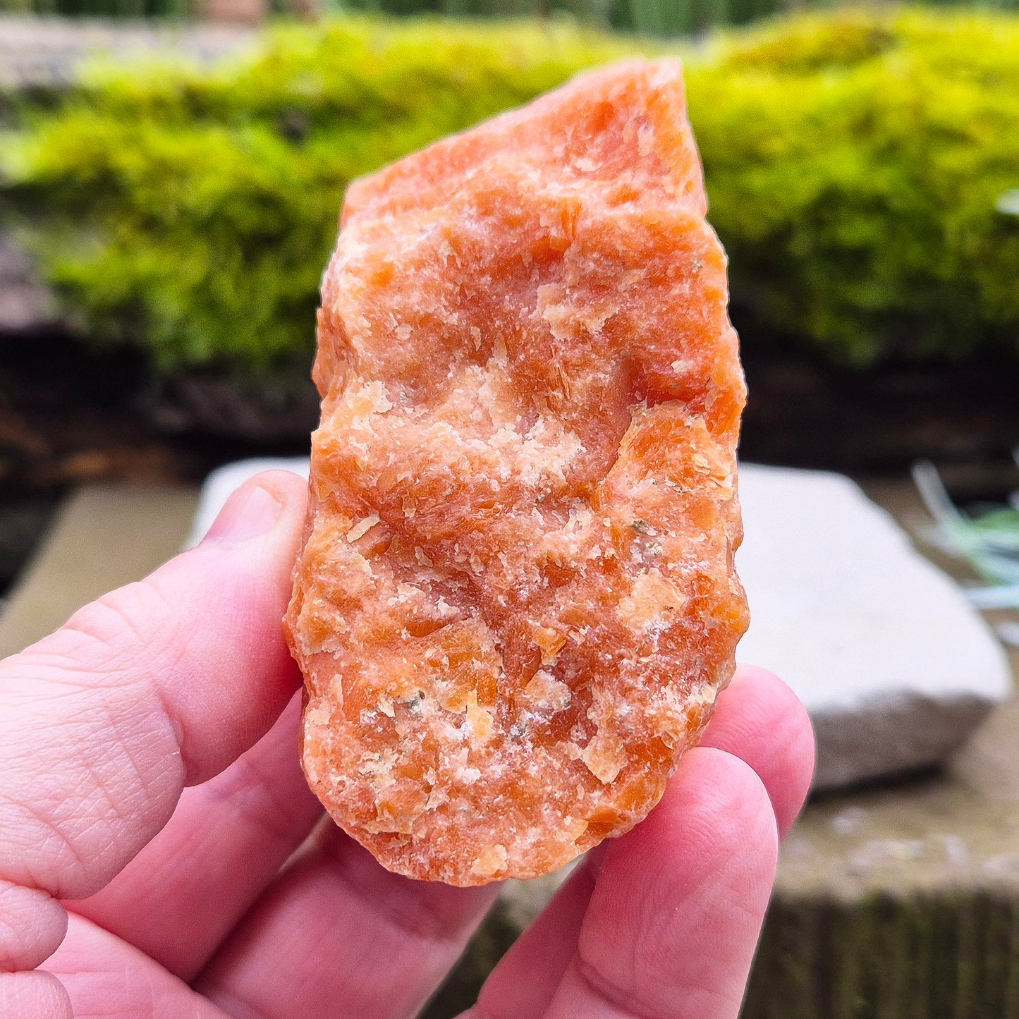 Orange Calcite, Natural Piece, Vibrant Color. While this crystal comes from a vein in the mine known for producing an infusion of orange calcite and black tourmaline, this piece appears to outwardly feature only the vibrant orange calcite.
