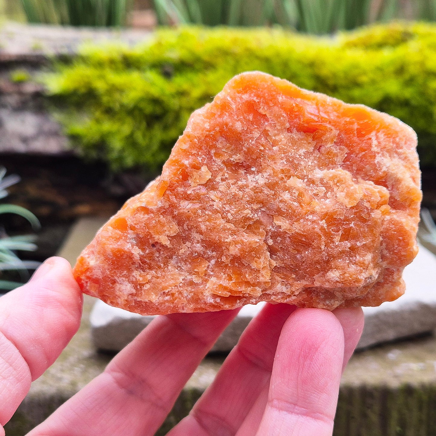 Orange Calcite, Natural Piece, Vibrant Color. While this crystal comes from a vein in the mine known for producing an infusion of orange calcite and black tourmaline, this piece appears to outwardly feature only the vibrant orange calcite.