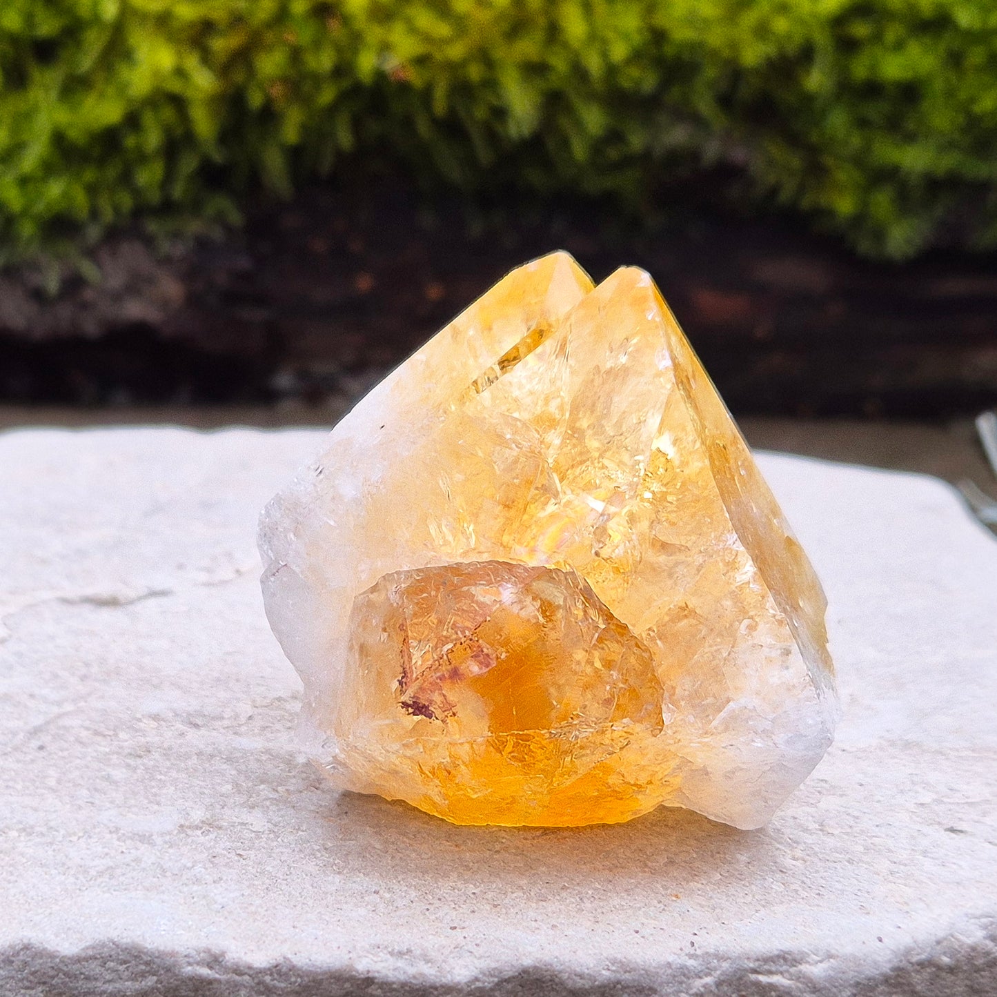 Citrine Crystal Standing Point from Brazil. Lovely pale golden colour with a double tip. Point is polished, sides are natural and the base is flat.