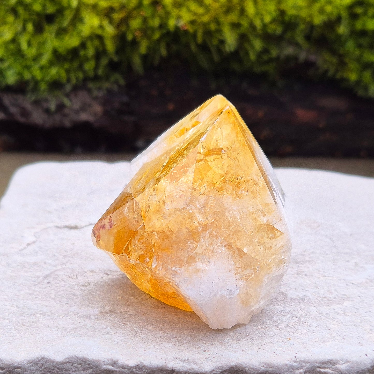 Citrine Crystal Standing Point from Brazil. Lovely pale golden colour with a double tip. Point is polished, sides are natural and the base is flat.