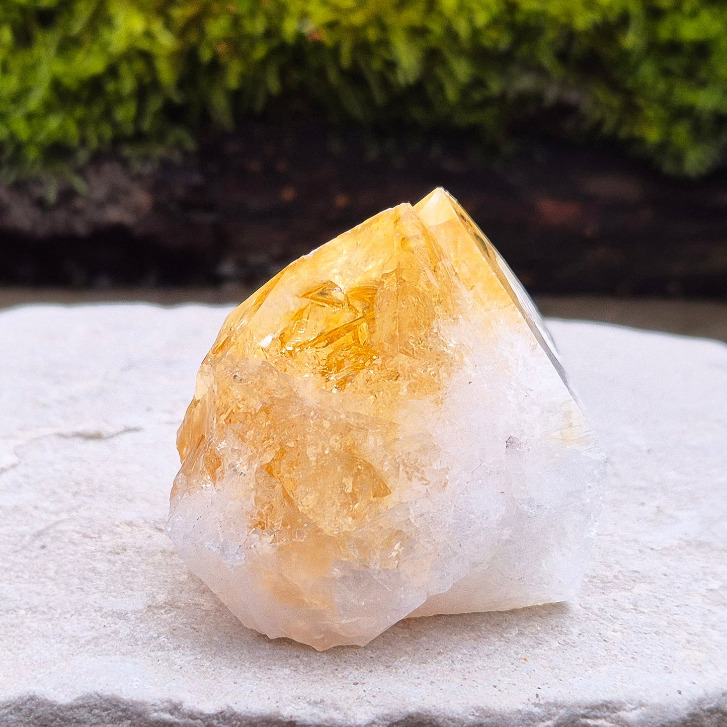 Citrine Crystal Standing Point from Brazil. Lovely pale golden colour with a double tip. Point is polished, sides are natural and the base is flat.