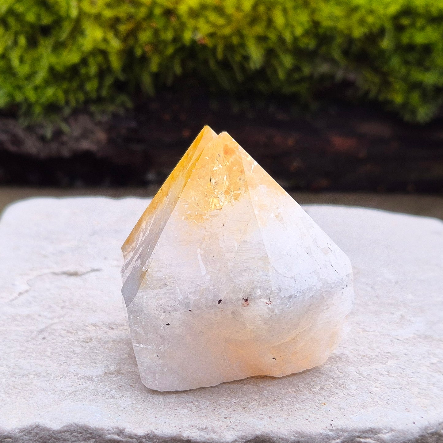 Citrine Crystal Standing Point from Brazil. Lovely pale golden colour with a double tip. Point is polished, sides are natural and the base is flat.