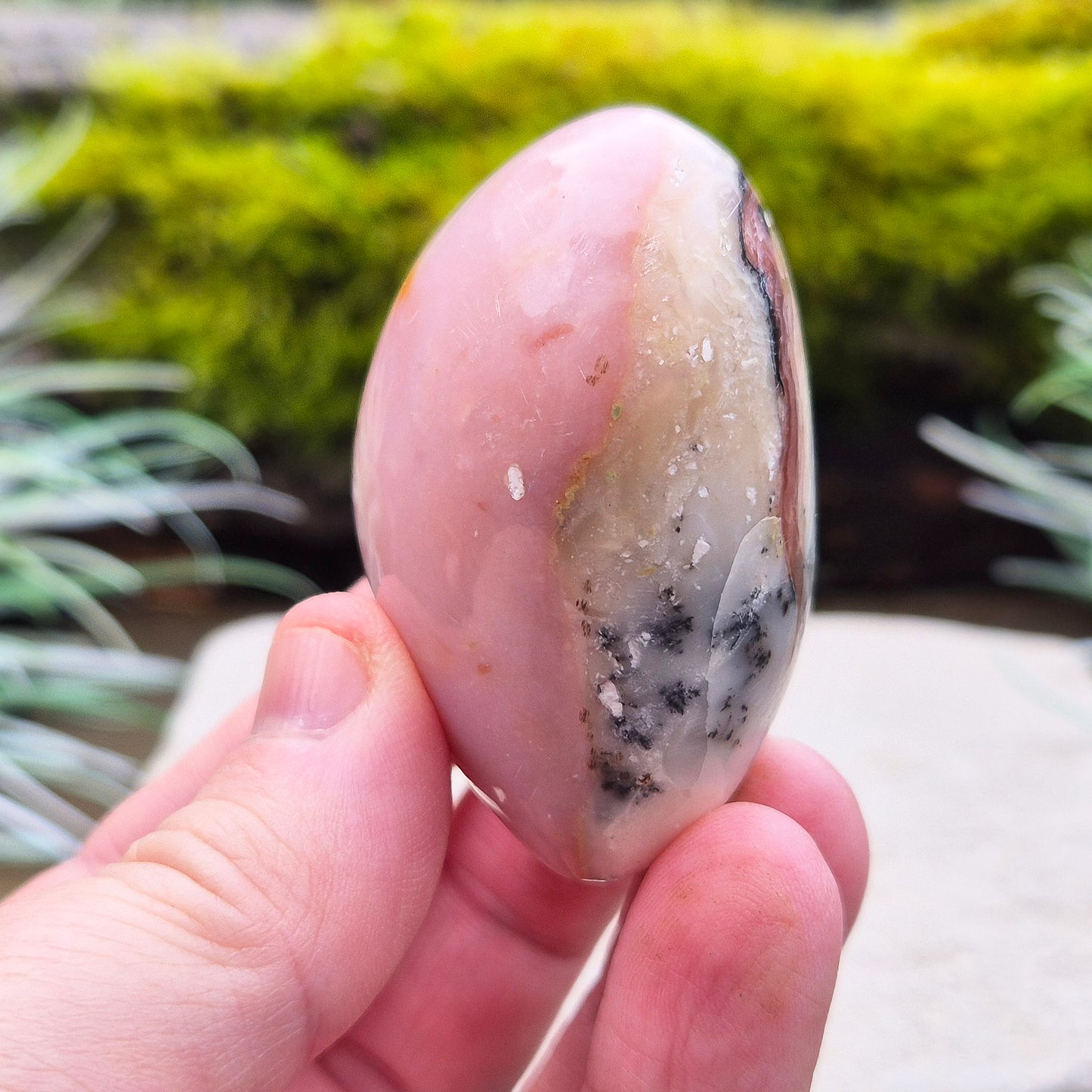 Pink Opal Crystal Heart with Dendritic inclusions, from Peru. Lovely dusky Pink colouring on one side and then on the other you can see some really lovely dendritic inclusions making this a great looking piece.