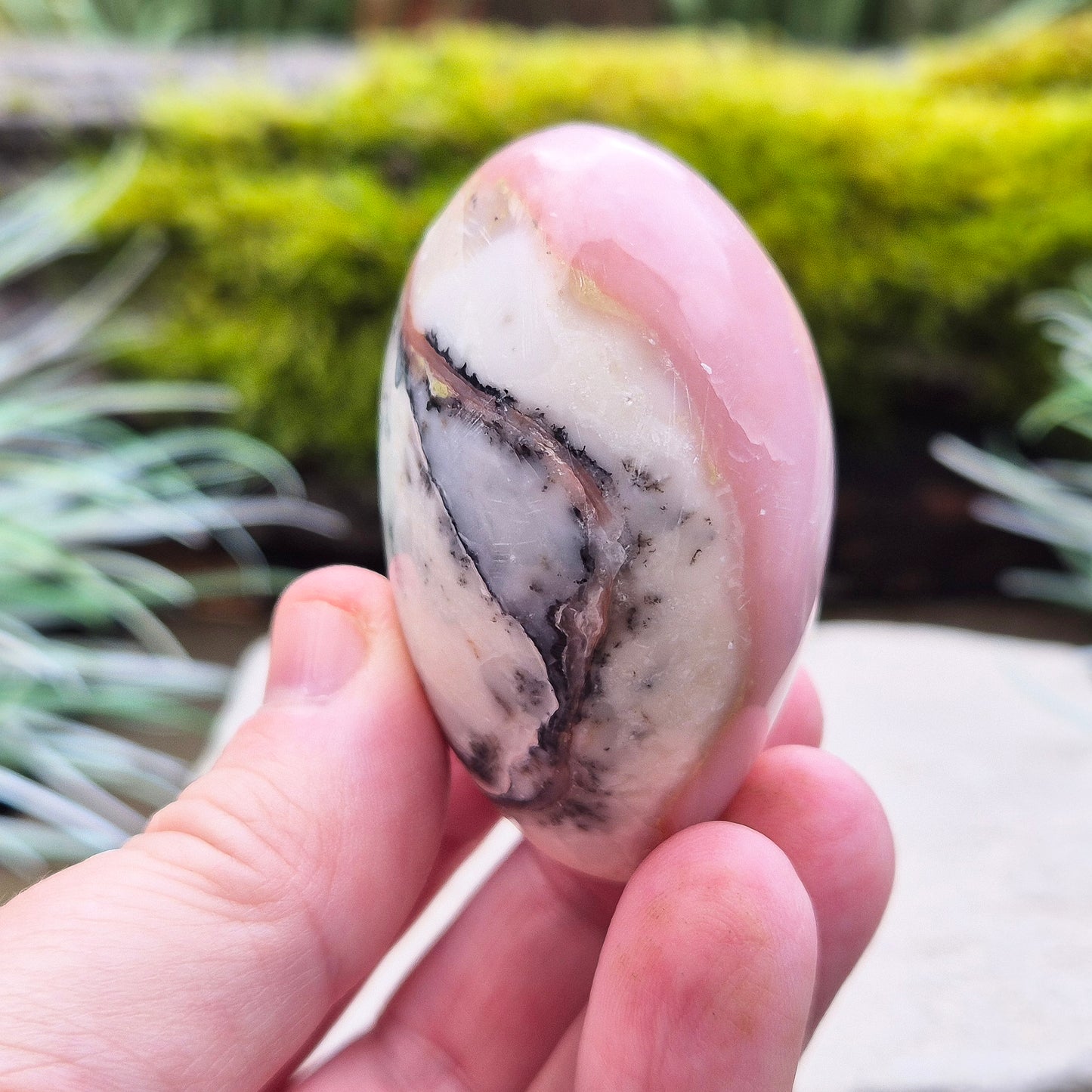 Pink Opal Crystal Heart with Dendritic inclusions, from Peru. Lovely dusky Pink colouring on one side and then on the other you can see some really lovely dendritic inclusions making this a great looking piece.