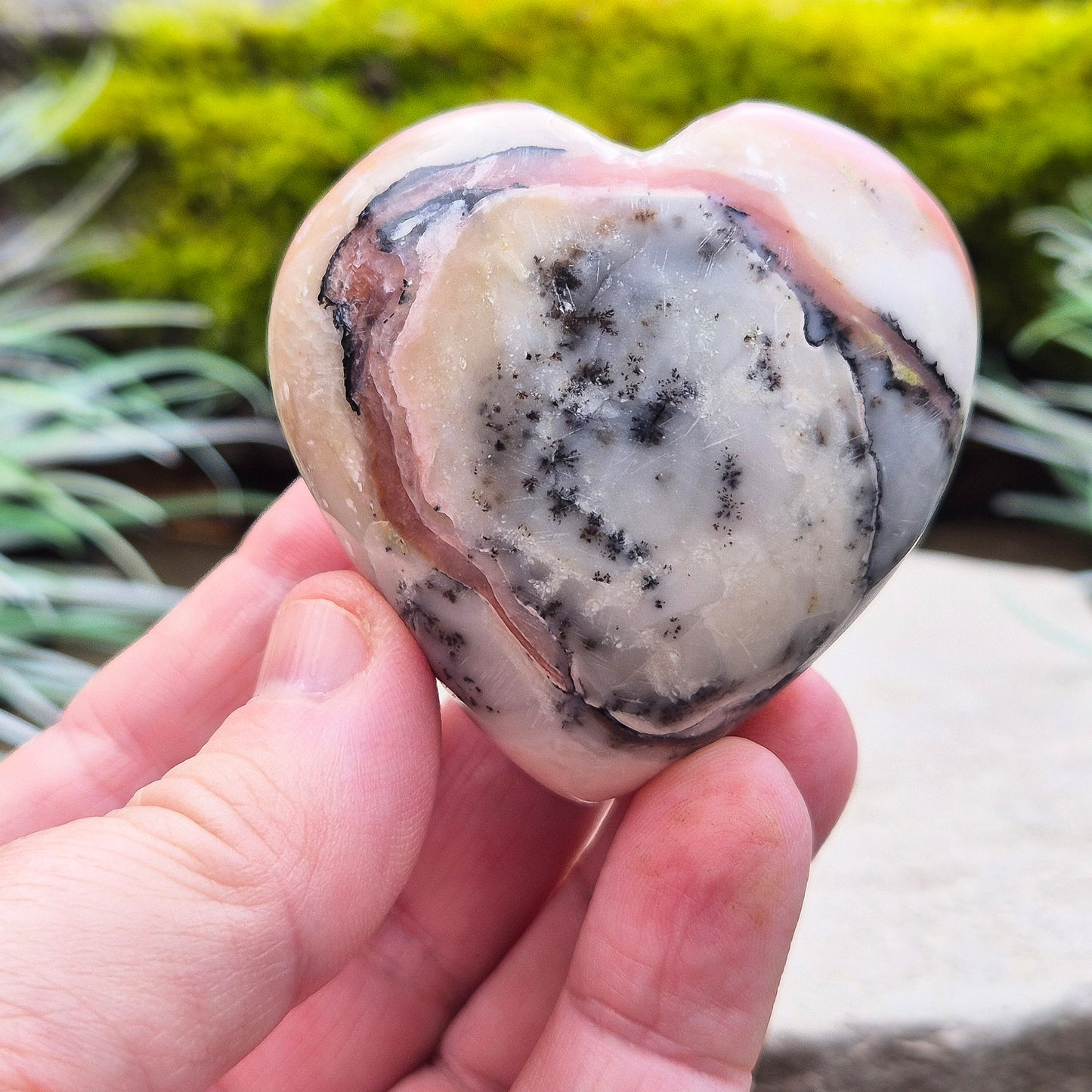 Pink Opal Crystal Heart with Dendritic inclusions, from Peru. Lovely dusky Pink colouring on one side and then on the other you can see some really lovely dendritic inclusions making this a great looking piece.