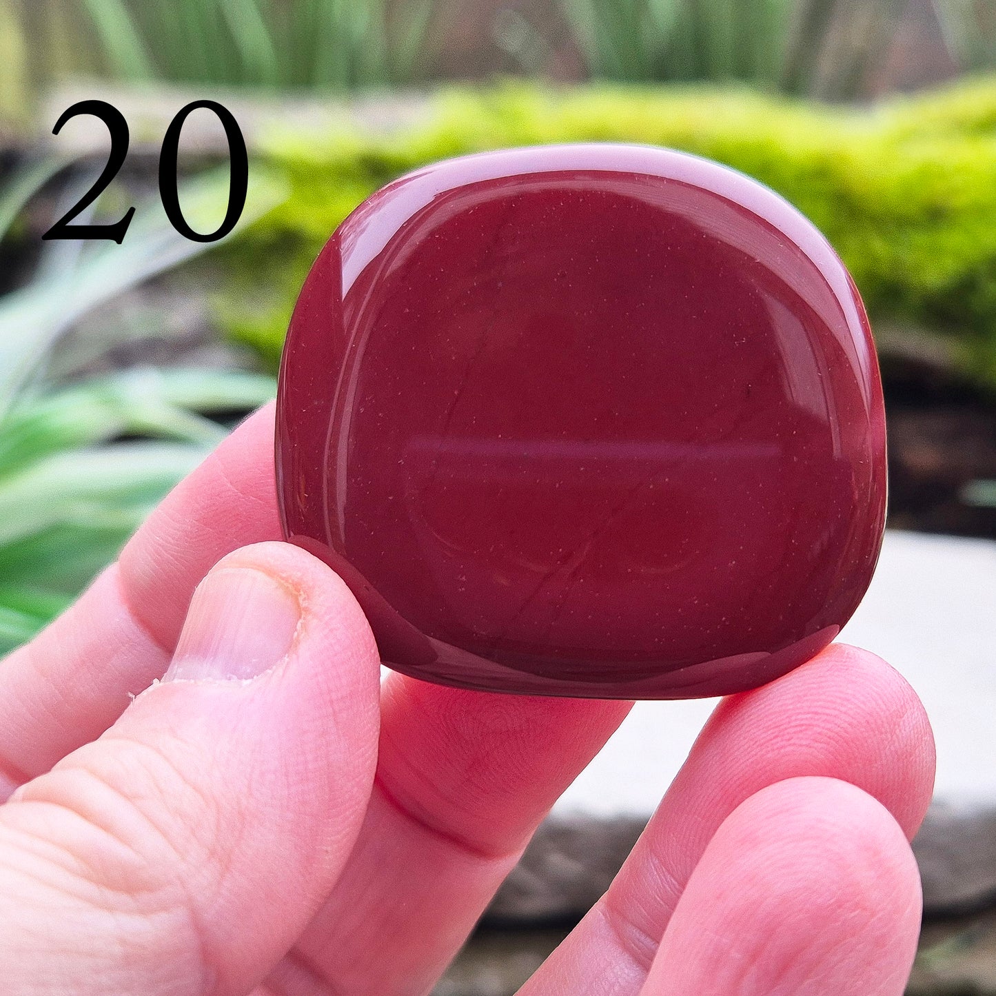 Mookaite Crystal Palm Stone. From the Mooka Creek region in Western Australia, each Mookaite palm stone displays a unique mix of earthy tones—reds, yellows, creams, and purples.