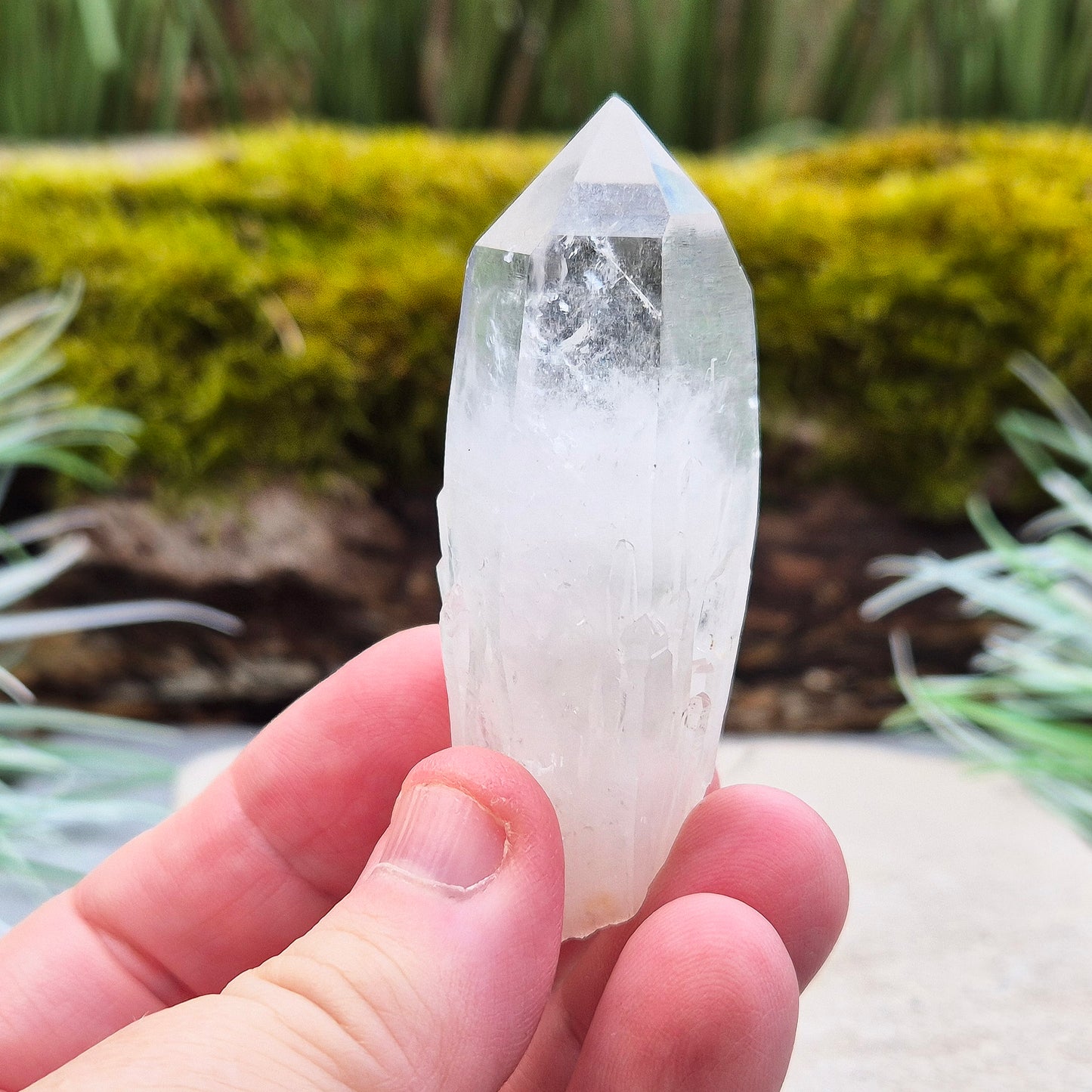 Quartz Crystal Point. From Atlas Mountains, Morocco. This is a wonderful natural quartz point with lots of companion crystals growing around it, very much like the formations you get on Pineapple Quartz.