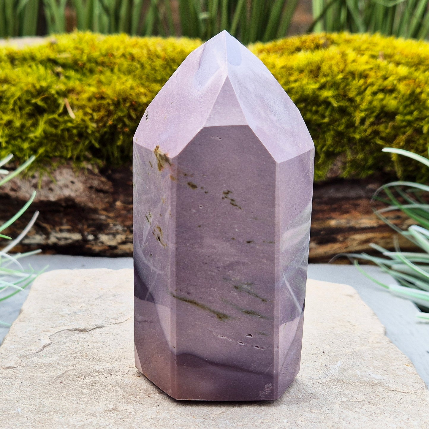 This striking Mookaite point features a rare purple gradient and a six-sided shape (7-3-7-3-7-3) that channels energy upward and outward. Known as a stone of strength, adaptability, and calm focus, Mookaite supports grounded growth and helps you move through change with confidence and ease.