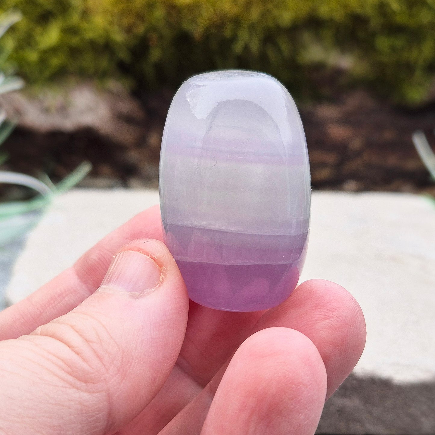 Lilac Fluorite Crystal. Lilac Fluorite also known as Lavender Fluorite is often described as a "balancing bridge" between the heart and the higher mind