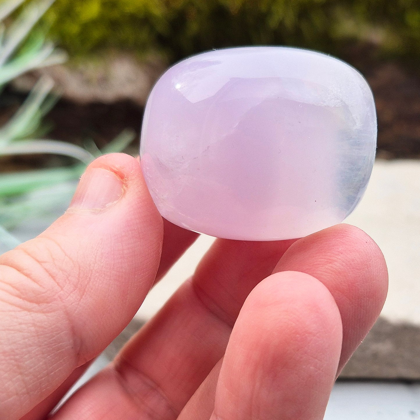 Lilac Fluorite Crystal. Lilac Fluorite also known as Lavender Fluorite is often described as a "balancing bridge" between the heart and the higher mind, offering a soothing energy that aids both emotional and spiritual harmony.