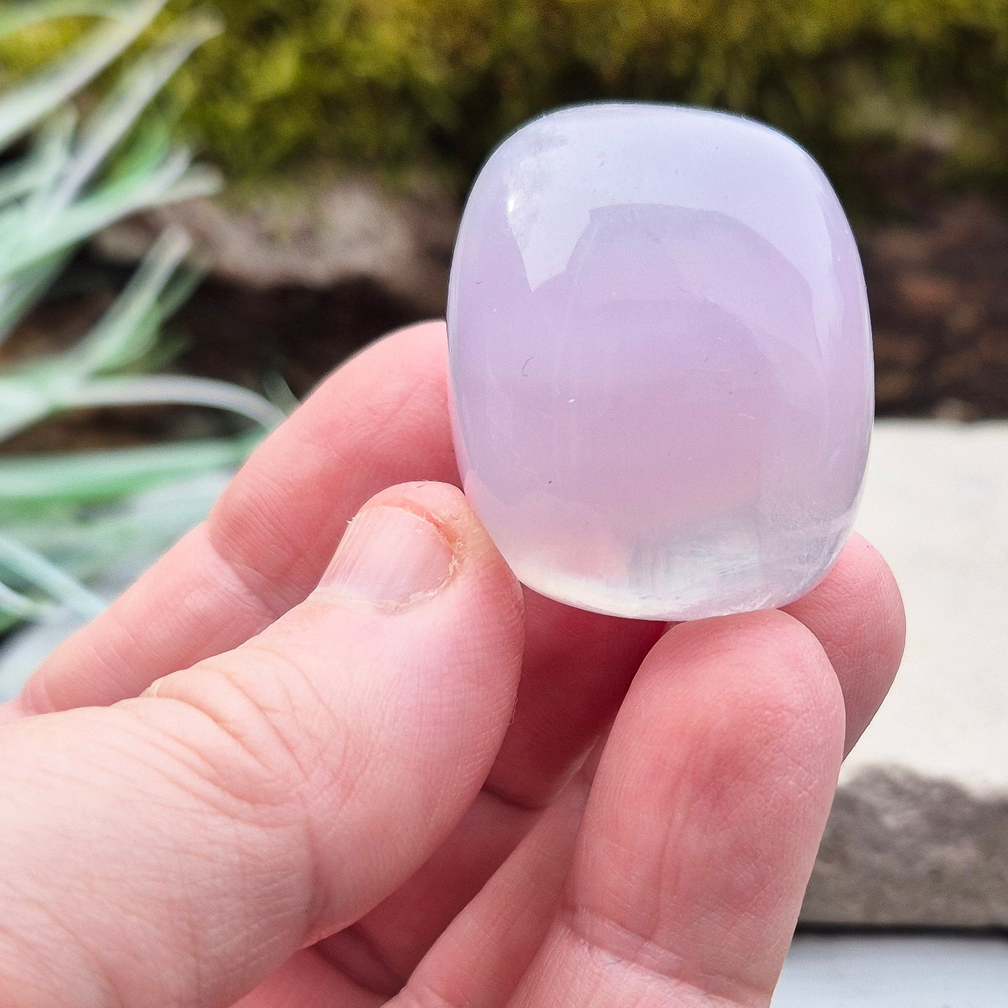 Lilac Fluorite Crystal. Lilac Fluorite also known as Lavender Fluorite is often described as a "balancing bridge" between the heart and the higher mind, offering a soothing energy that aids both emotional and spiritual harmony.