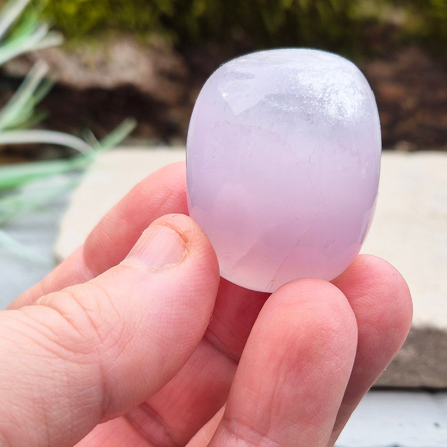 Lilac Fluorite Crystal. Lilac Fluorite also known as Lavender Fluorite is often described as a "balancing bridge" between the heart and the higher mind, offering a soothing energy that aids both emotional and spiritual harmony.