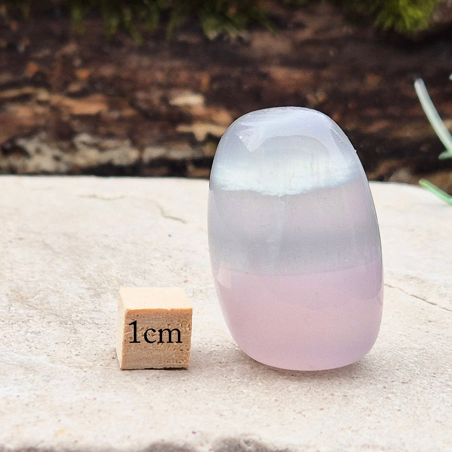 Lilac Fluorite Crystal. Lilac Fluorite also known as Lavender Fluorite is often described as a "balancing bridge" between the heart and the higher mind, offering a soothing energy that aids both emotional and spiritual harmony.