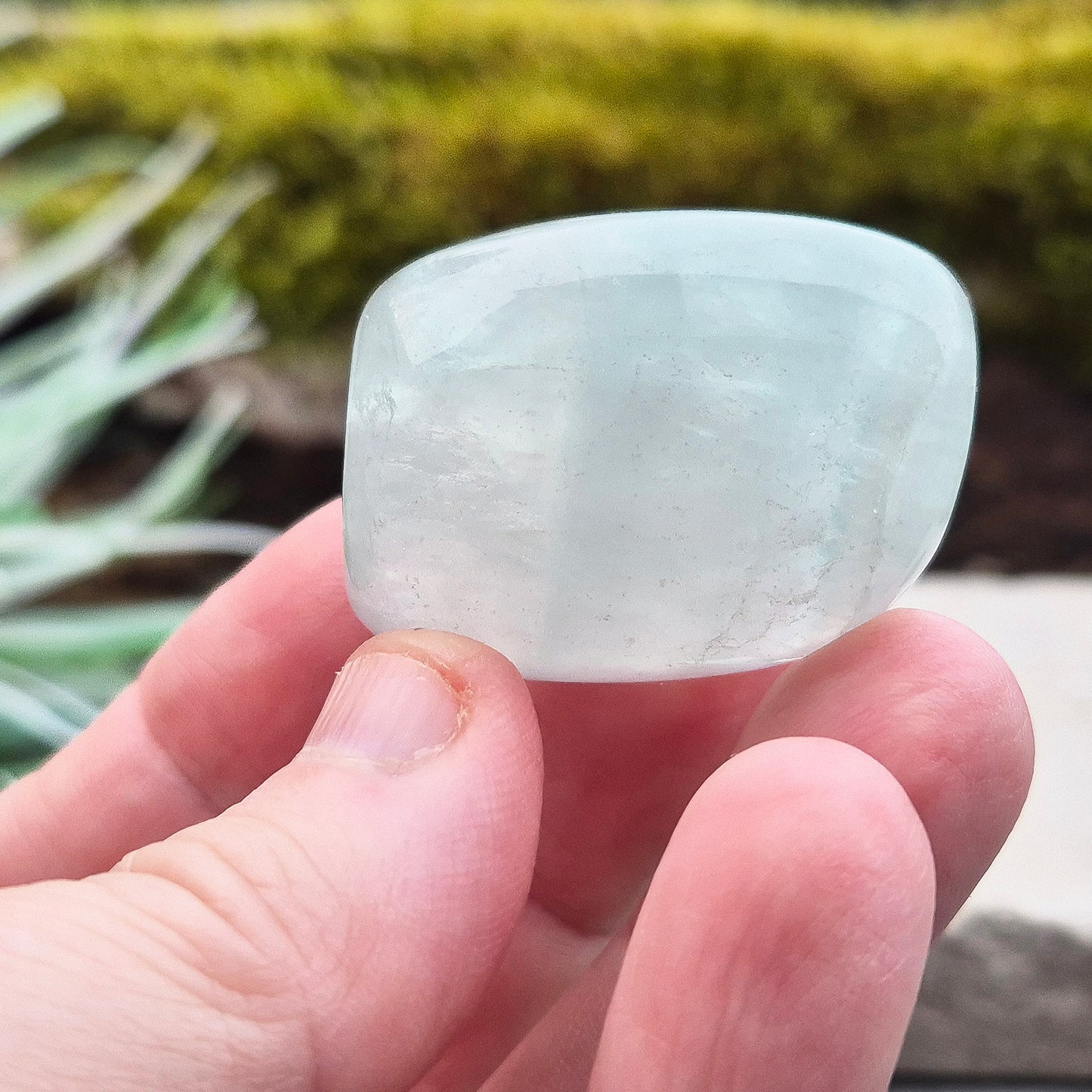 Green Fluorite Crystal. This crystal features a smooth, polished barrel-like shape with softly rounded edges, and will stand upright. From China.