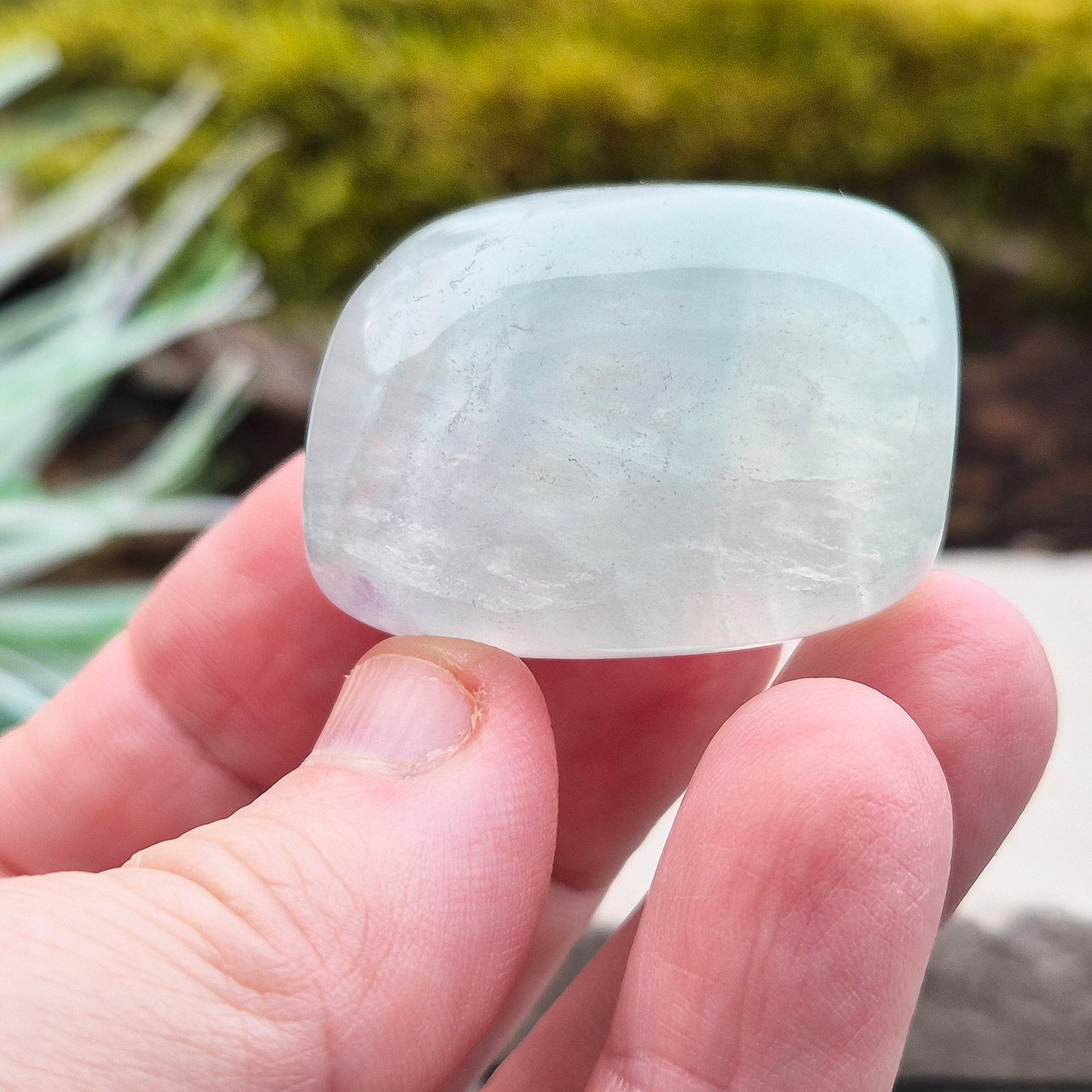 Green Fluorite Crystal. This crystal features a smooth, polished barrel-like shape with softly rounded edges, and will stand upright. From China.