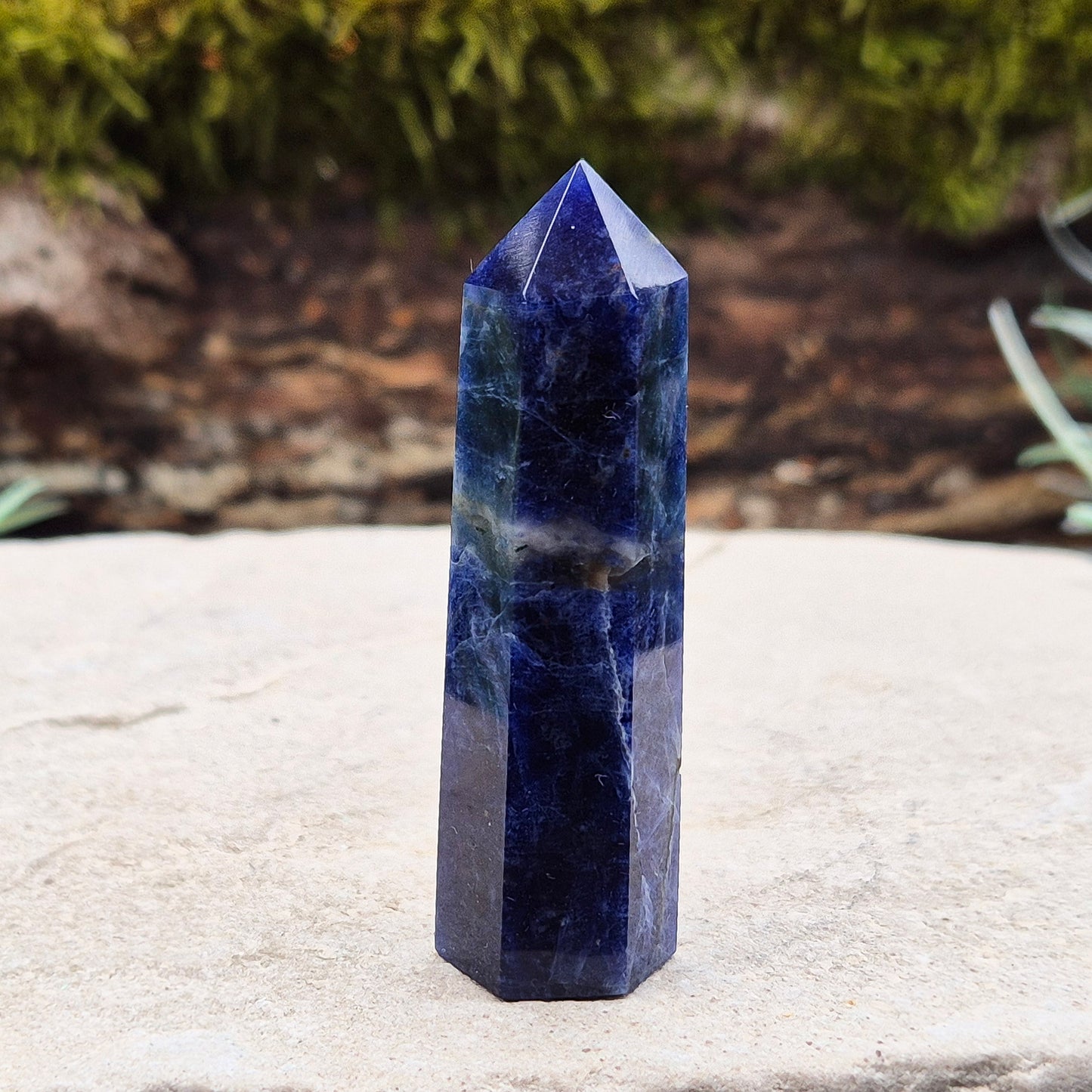 Sodalite Crystal Point. A grade. From Namibia. Nice royal blue colouring and marking. 6 sided generator tip.