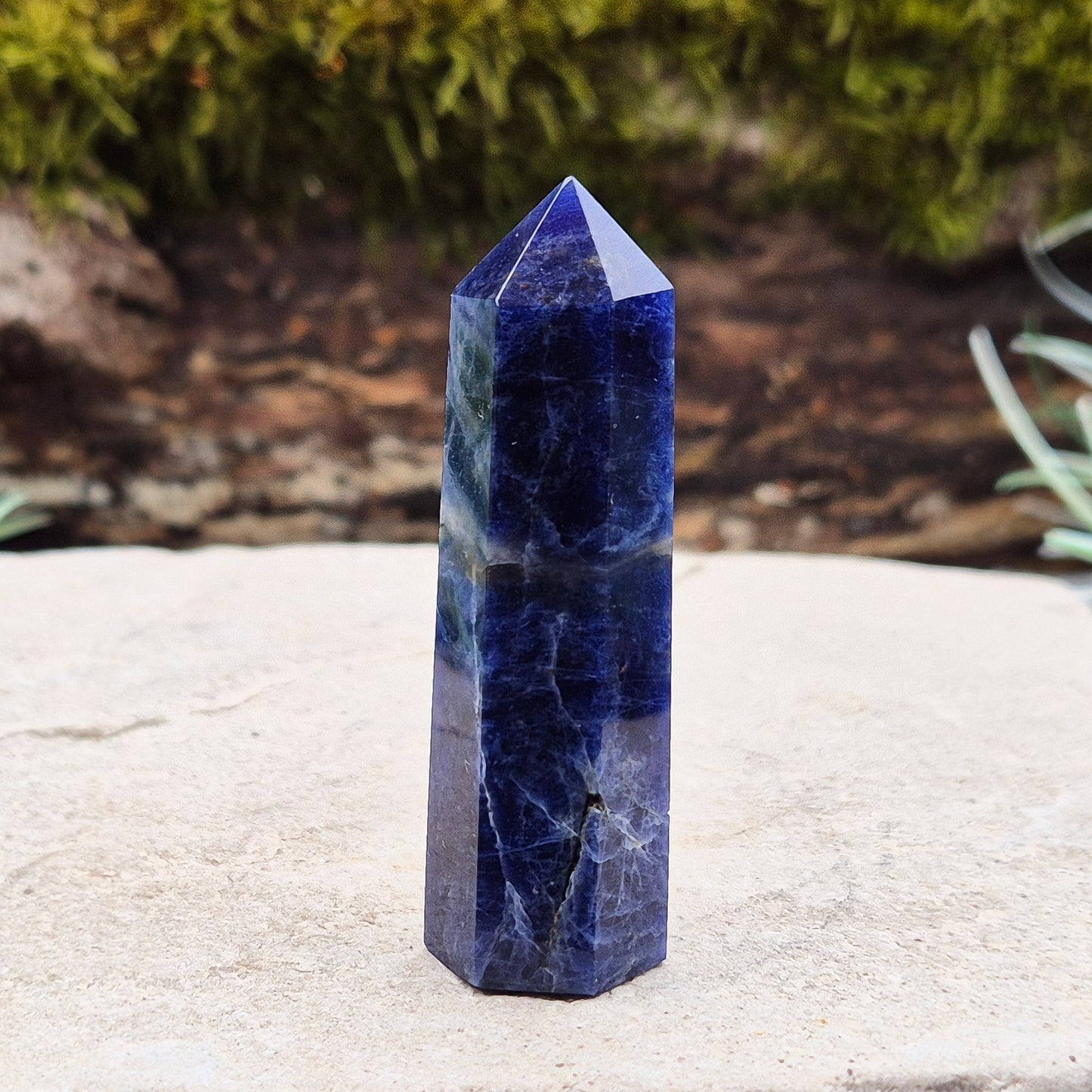Sodalite Crystal Point. A grade. From Namibia. Nice royal blue colouring and marking. 6 sided generator tip.