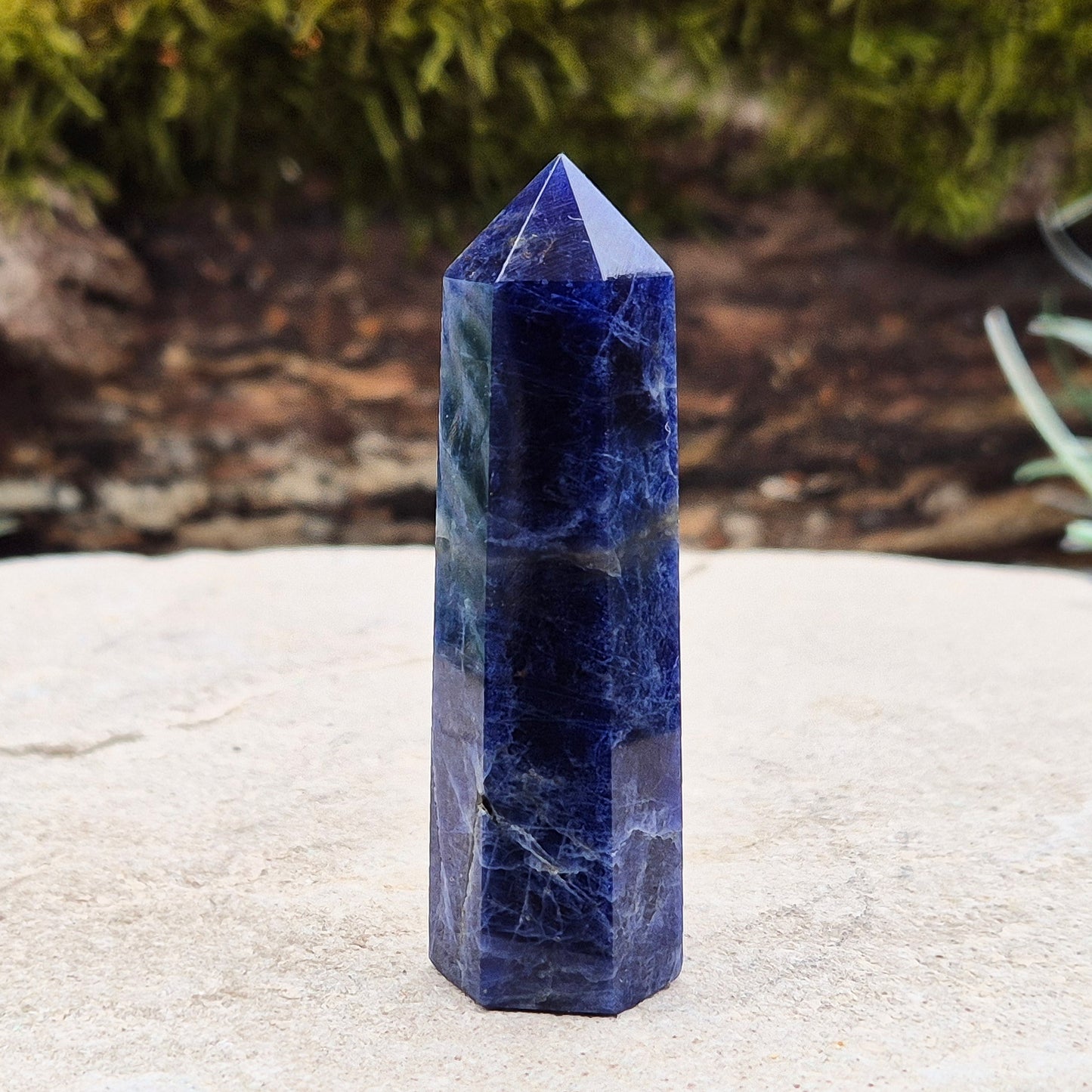 Sodalite Crystal Point. A grade. From Namibia. Nice royal blue colouring and marking. 6 sided generator tip.