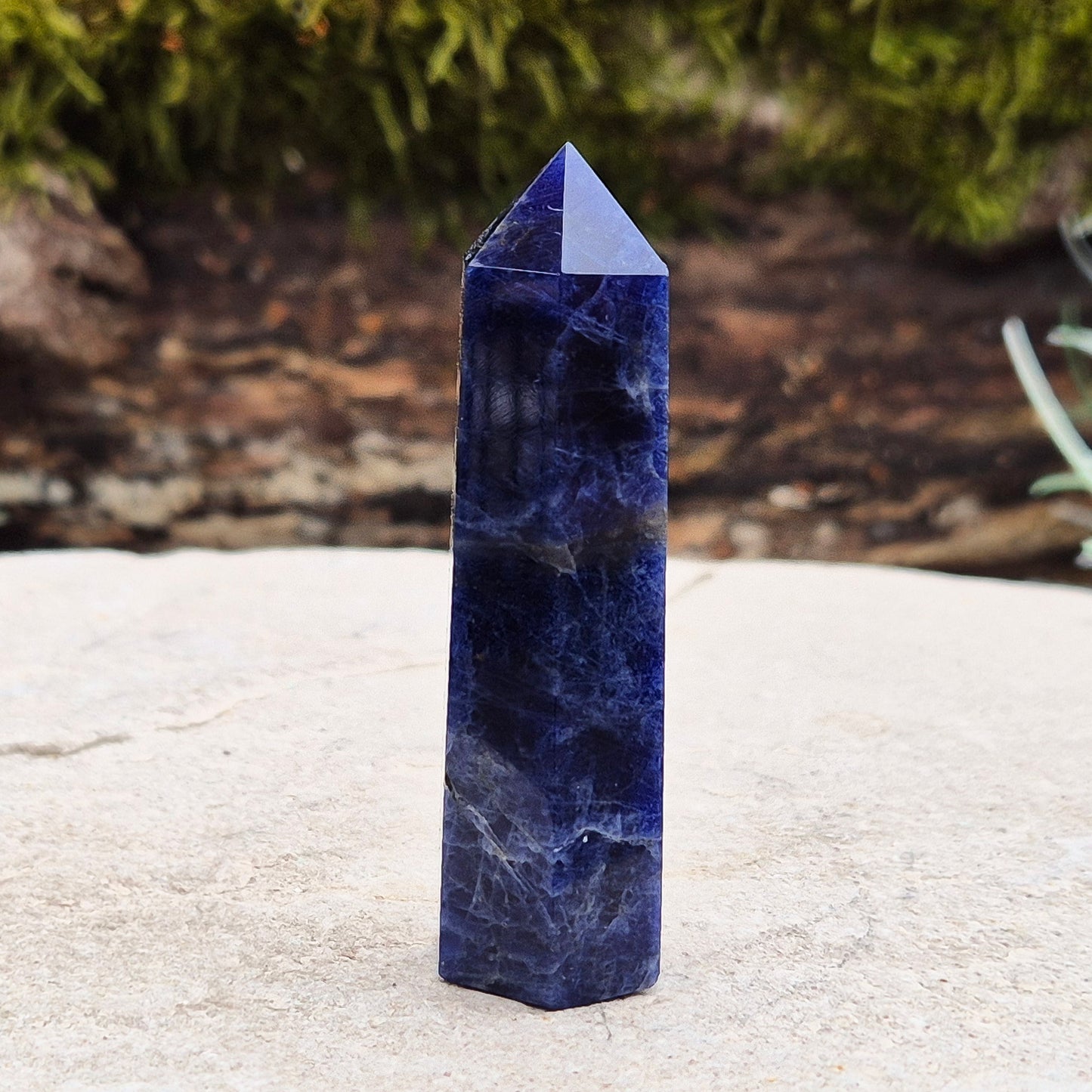 Sodalite Crystal Point. A grade. From Namibia. Nice royal blue colouring and marking. 6 sided generator tip.
