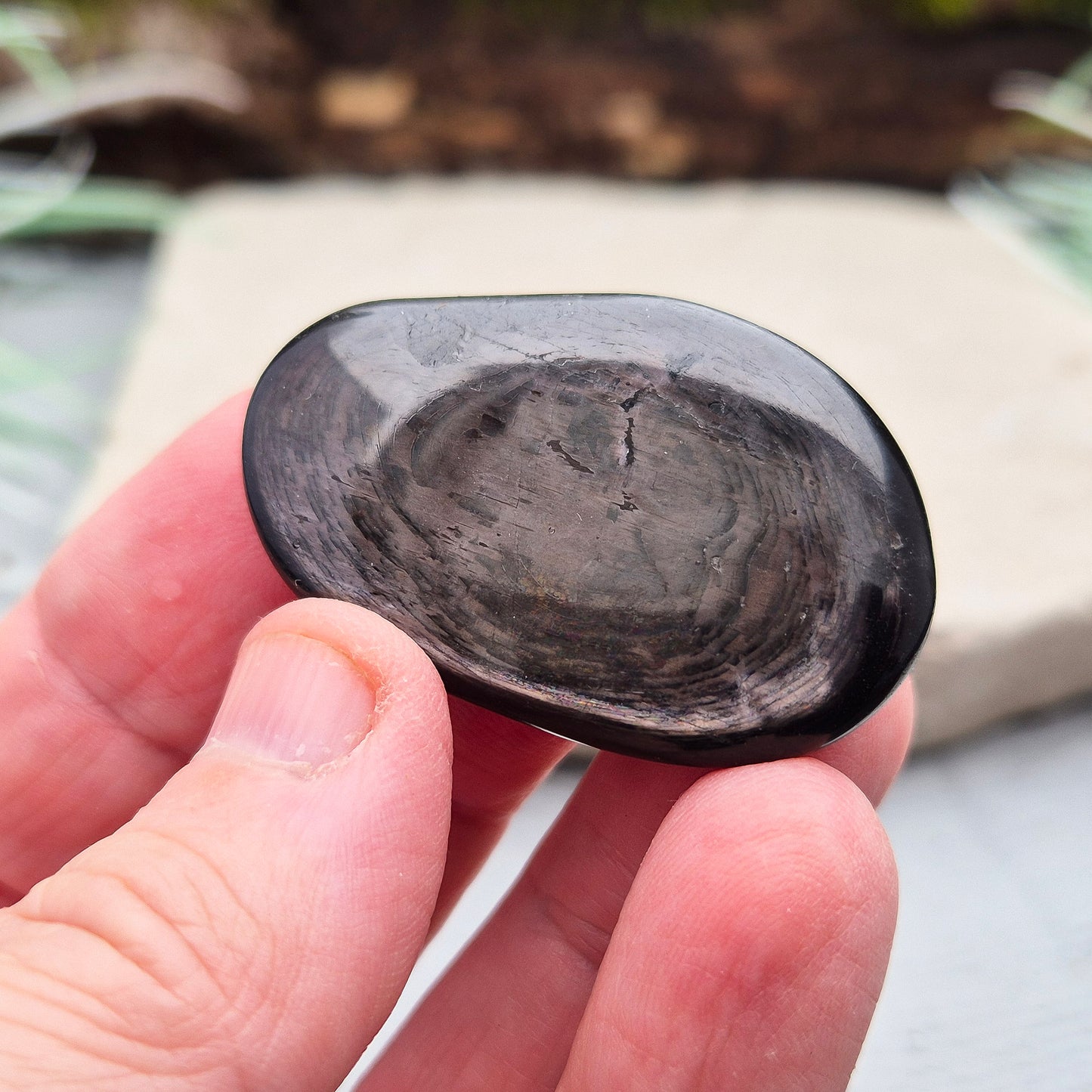Violet Hypersthene Palm Stone. Hypersthene is a rare, beautiful stone with deep, velvety violet hues that shimmer in the light. Sourced from Quebec’s Labrador Trough in Canada