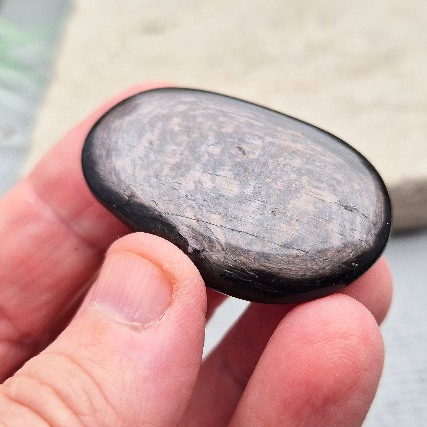 Violet Hypersthene Palm Stone. Hypersthene is a rare, beautiful stone with deep, velvety violet hues that shimmer in the light. Sourced from Quebec’s Labrador Trough in Canada