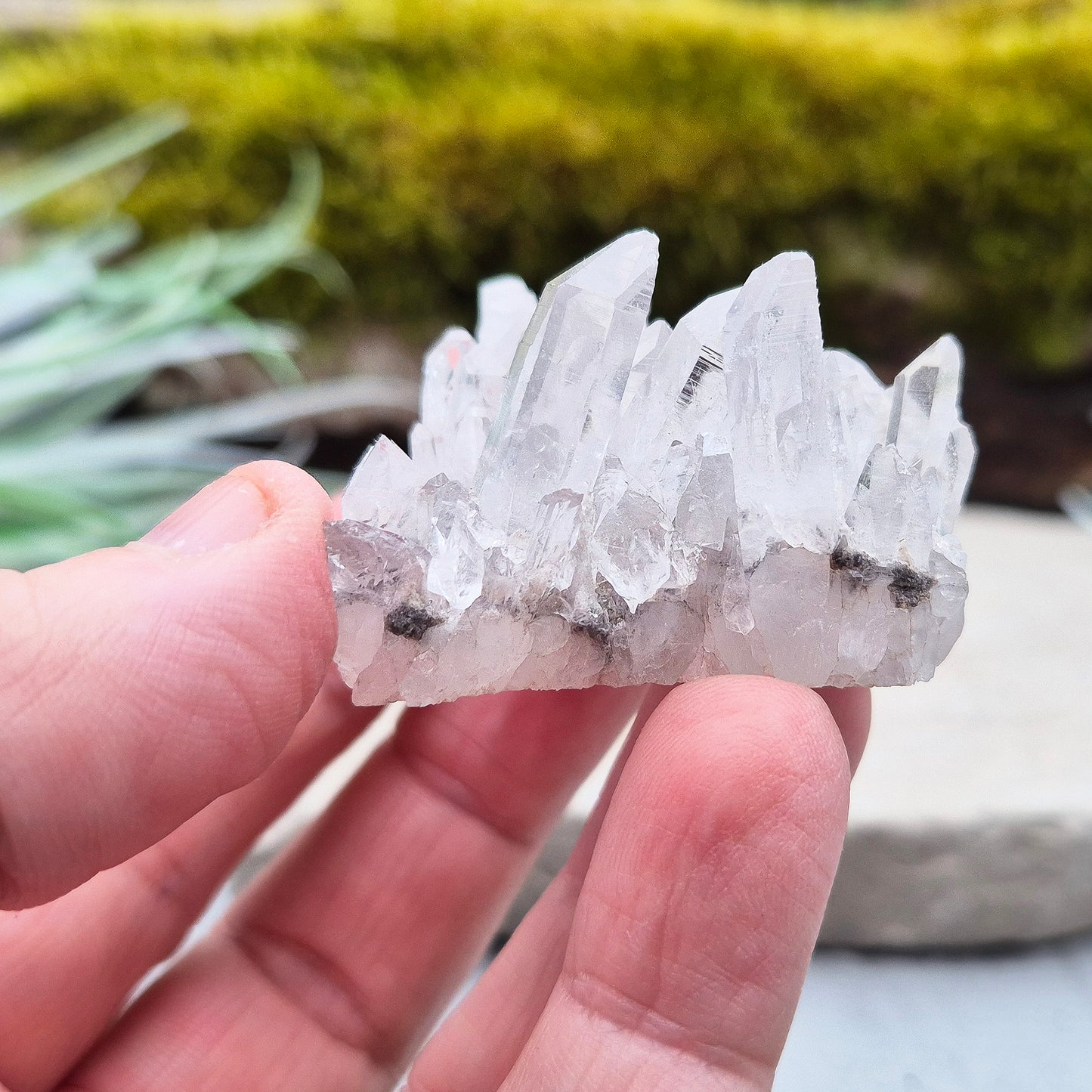 Quartz Crystal Cluster. Guangdong Province, China. This cluster comprises of needle like quartz points. Has a flat base so will self stand.