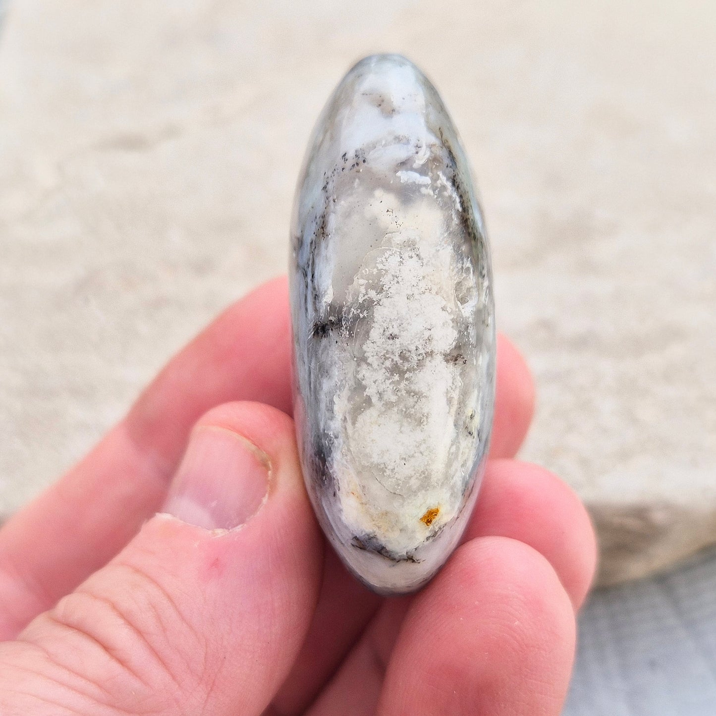 Shop Dendritic Opal Palm Stones for grounding, intuition, and spiritual growth. Handcrafted, polished, and energy-cleansed crystals from Madagascar.