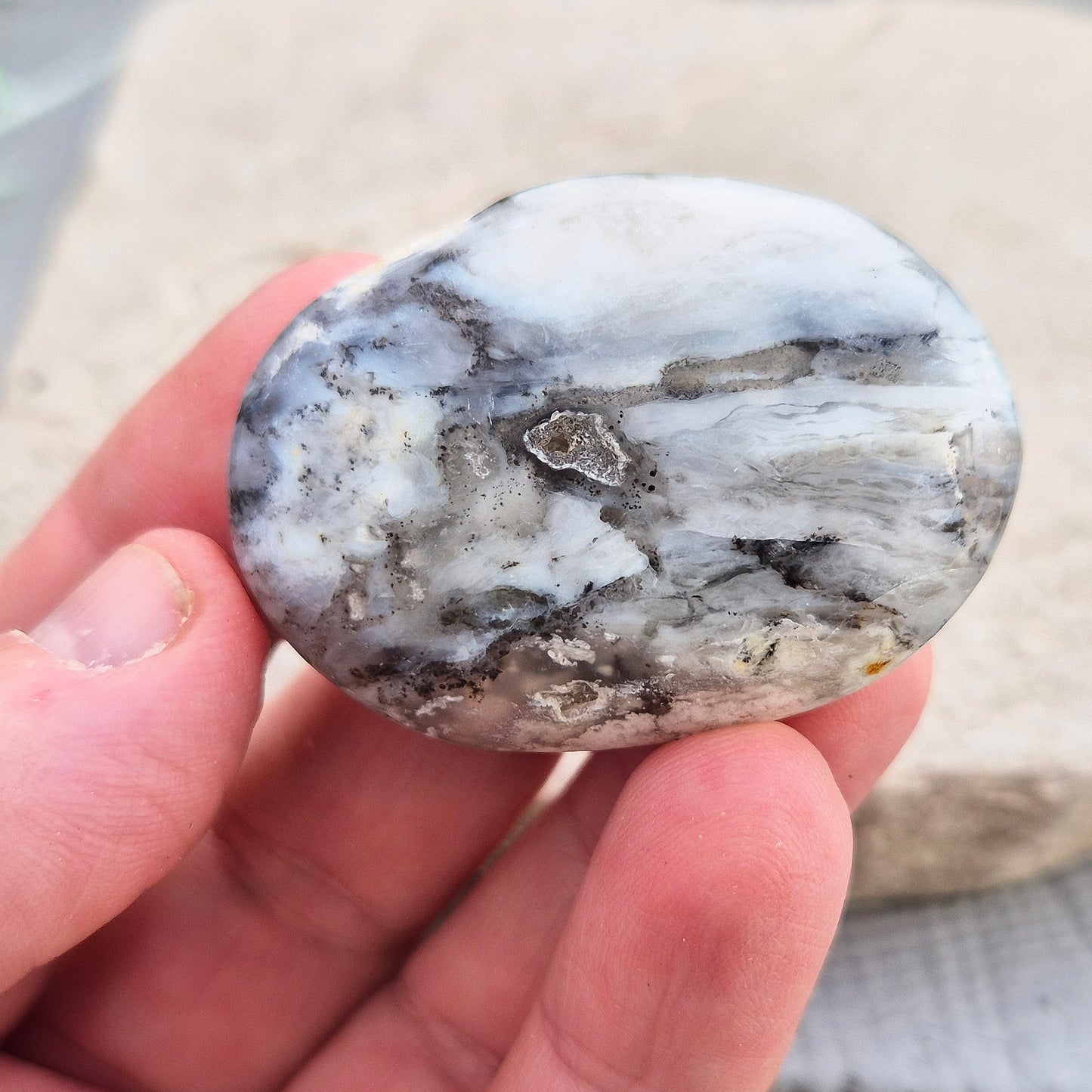 Shop Dendritic Opal Palm Stones for grounding, intuition, and spiritual growth. Handcrafted, polished, and energy-cleansed crystals from Madagascar.