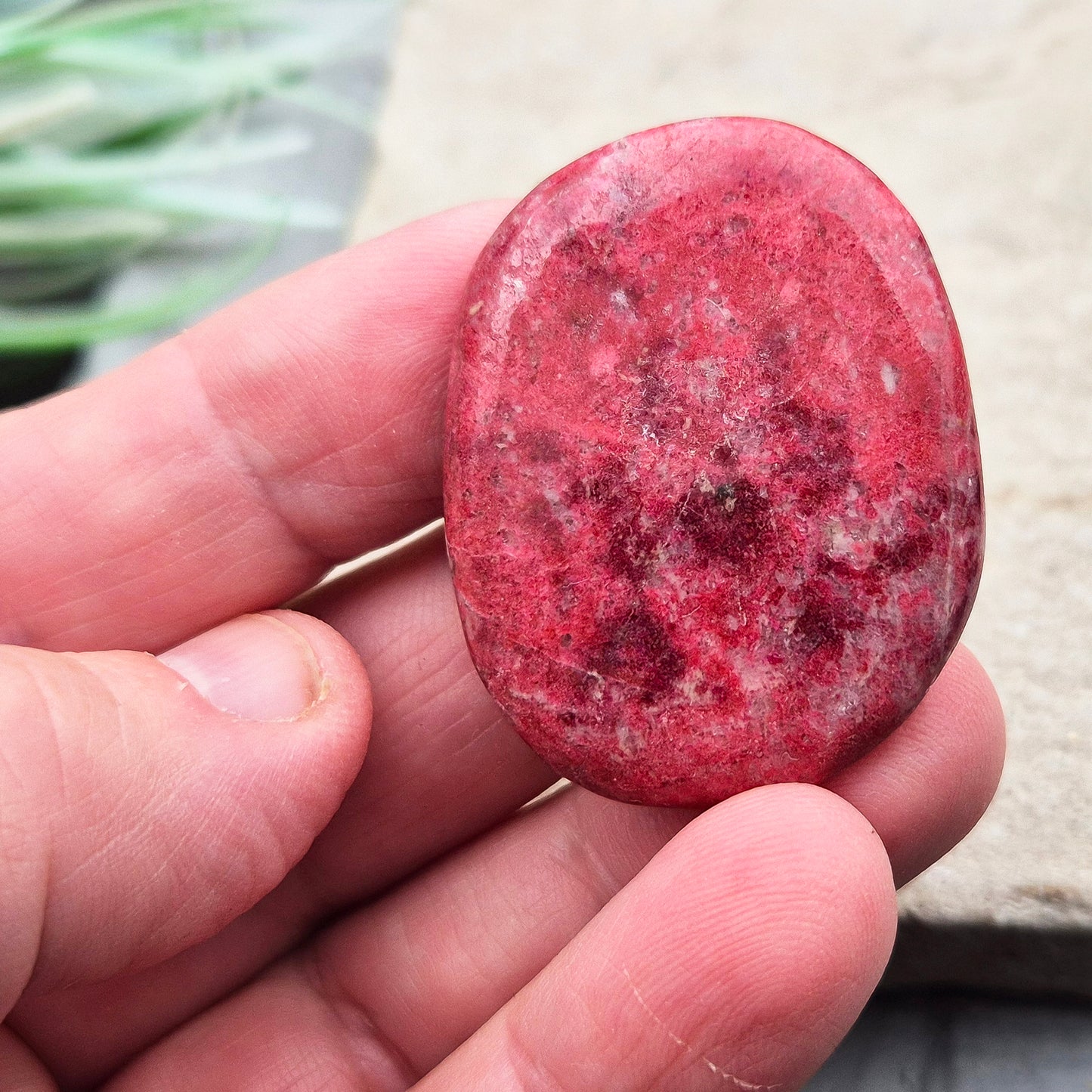 Discover Pink Thulite Palm Stones – natural crystals that bring vibrant energy and emotional balance. Perfect for display, meditation, or healing work.
