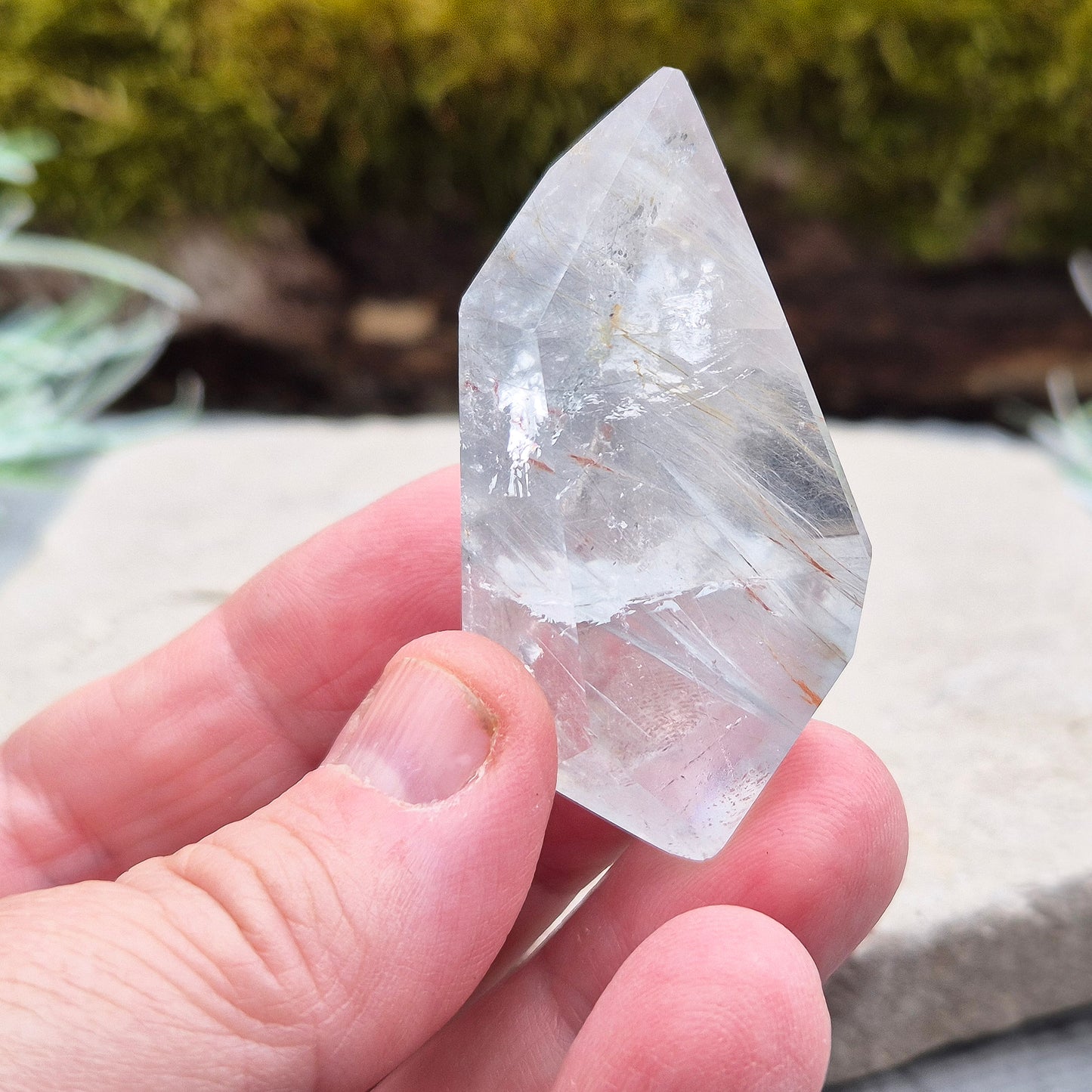 Blue Tara, also known as Indicolite Quartz, is a rare and captivating crystal featuring natural Blue Tourmaline inclusions within Quartz. This rare crystal combination-featuring fine blue needles to misty, cloud-like patterns
