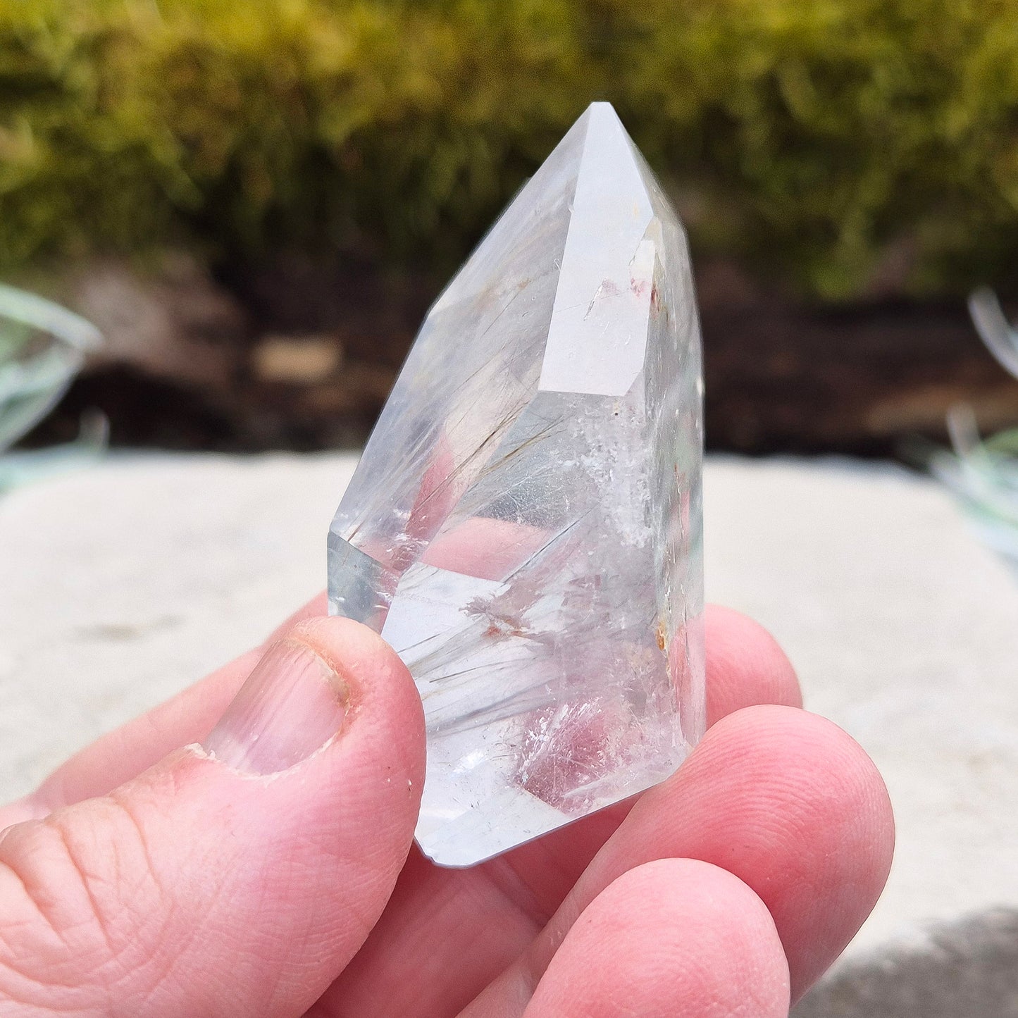 Blue Tara, also known as Indicolite Quartz, is a rare and captivating crystal featuring natural Blue Tourmaline inclusions within Quartz. This rare crystal combination-featuring fine blue needles to misty, cloud-like patterns