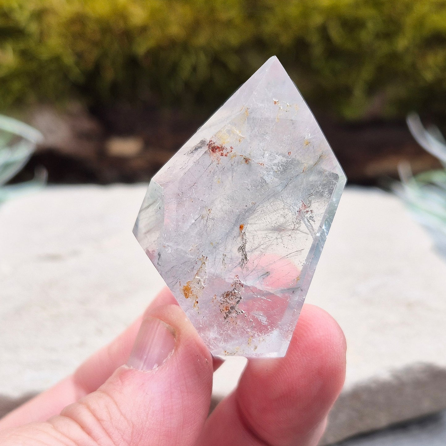 Blue Tara, also known as Indicolite Quartz, is a rare and captivating crystal featuring natural Blue Tourmaline inclusions within Quartz. This rare crystal combination-featuring fine blue needles to misty, cloud-like patterns