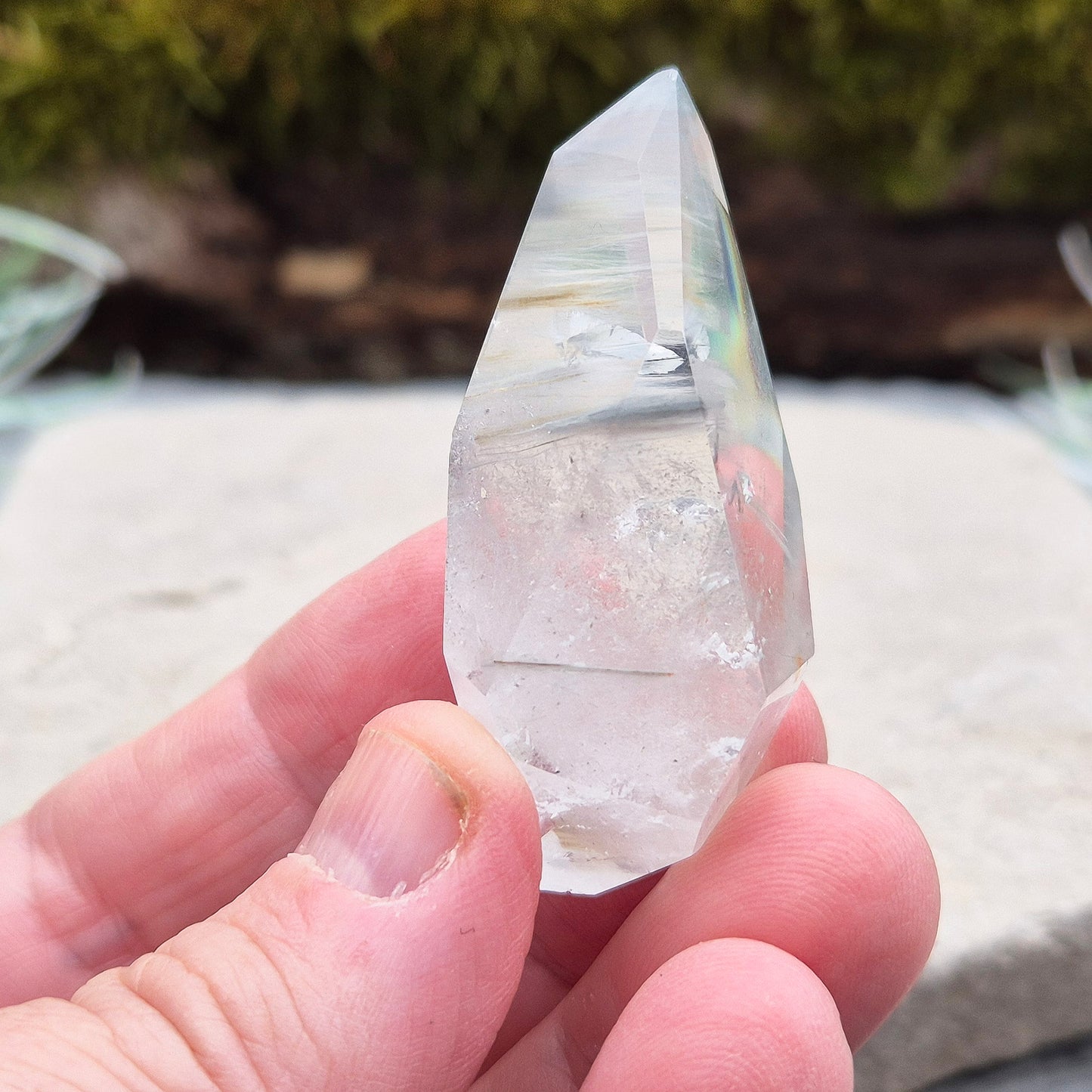 Blue Tara, also known as Indicolite Quartz, is a rare and captivating crystal featuring natural Blue Tourmaline inclusions within Quartz. This rare crystal combination-featuring fine blue needles to misty, cloud-like patterns