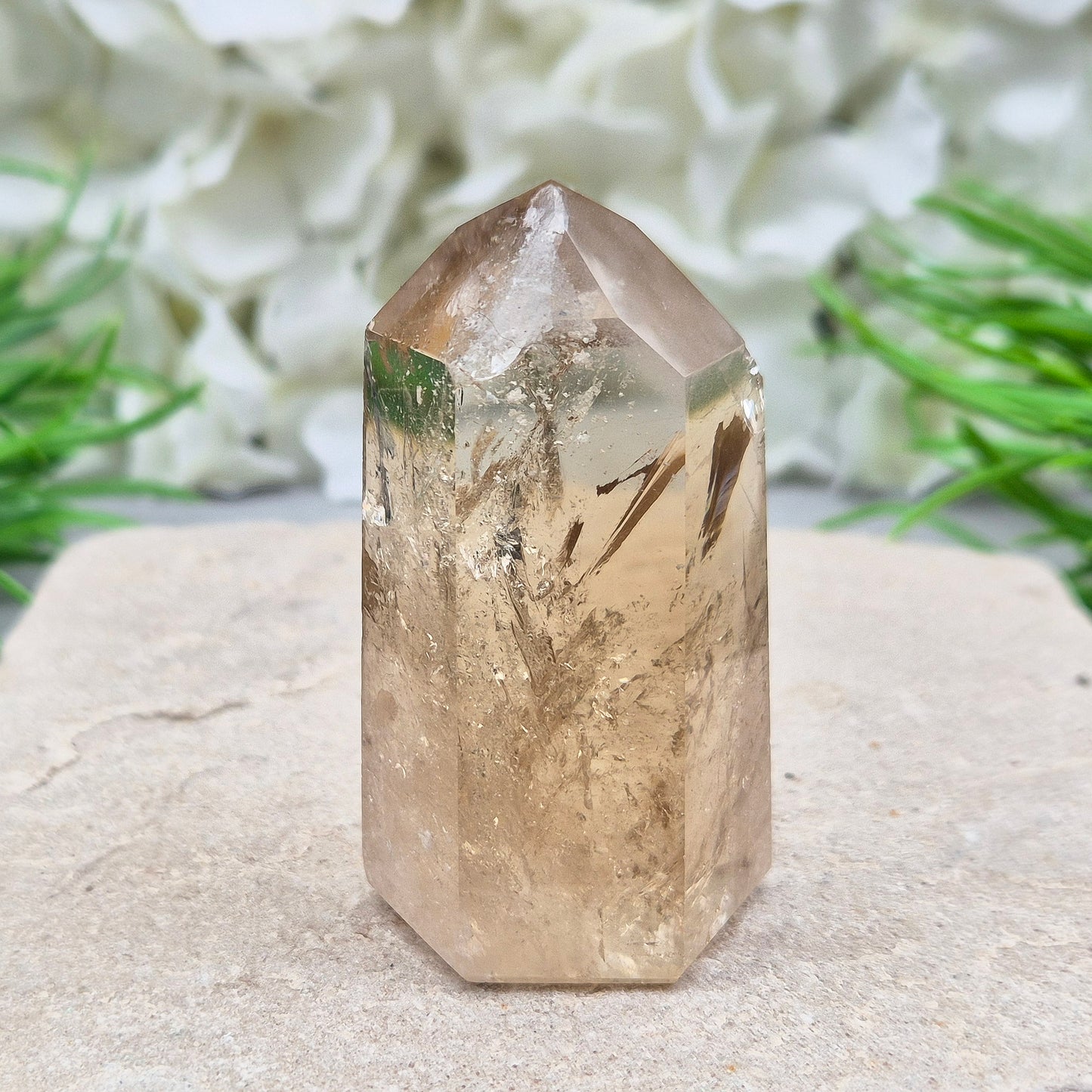 Natural Untreated polished Citrine Point sourced and polished in Brazil. Wonderful citrine colour with light reflecting inclusions and a rainbow within it. Finding natural citrine is becoming more difficult so I am delighted to have this piece. Reduced as it has a small nick on one of the sides of the point so reduced from £75.75 to £61.25