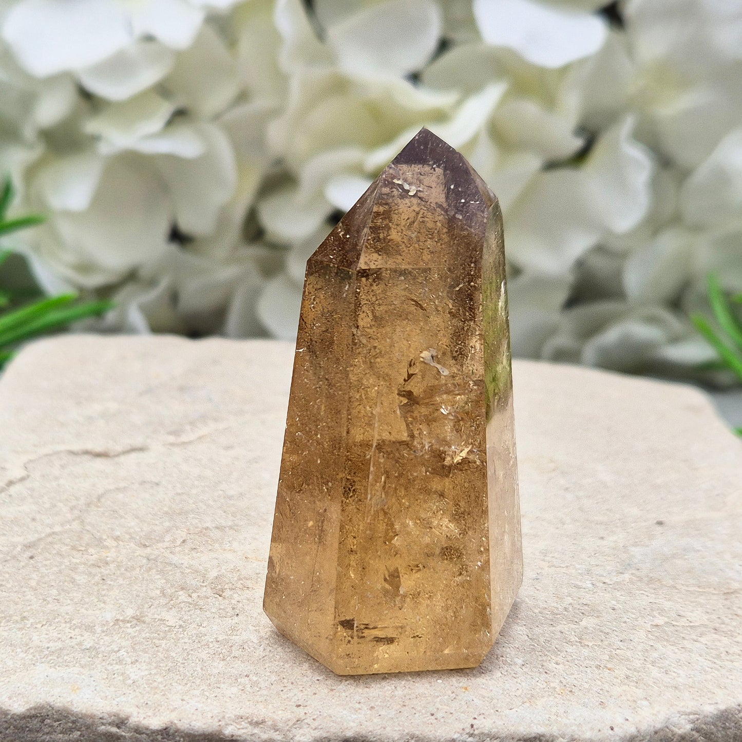 Natural Untreated polished Citrine Point sourced and polished in Brazil. Wonderful dark honey citrinecolour with light reflecting inclusions.